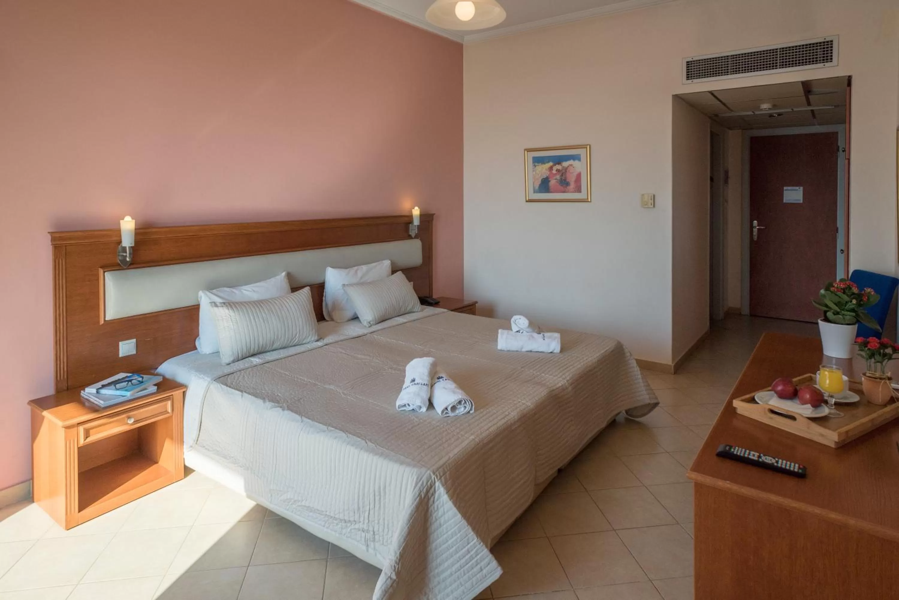 Bed in Acharnis Kavallari Hotel Suites