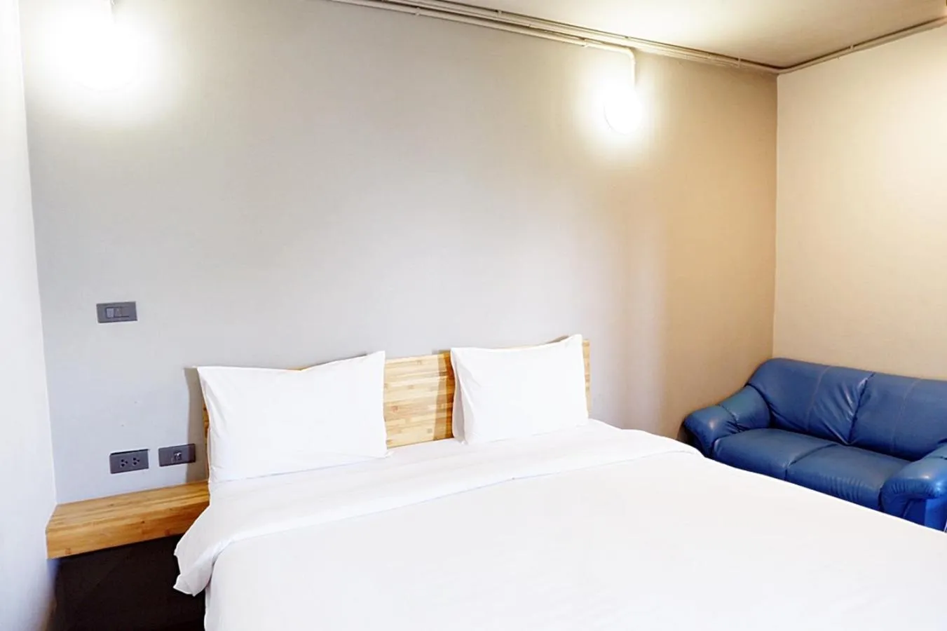 Photo of the whole room, Bed in Izen Plus Budget Hotel & Residence