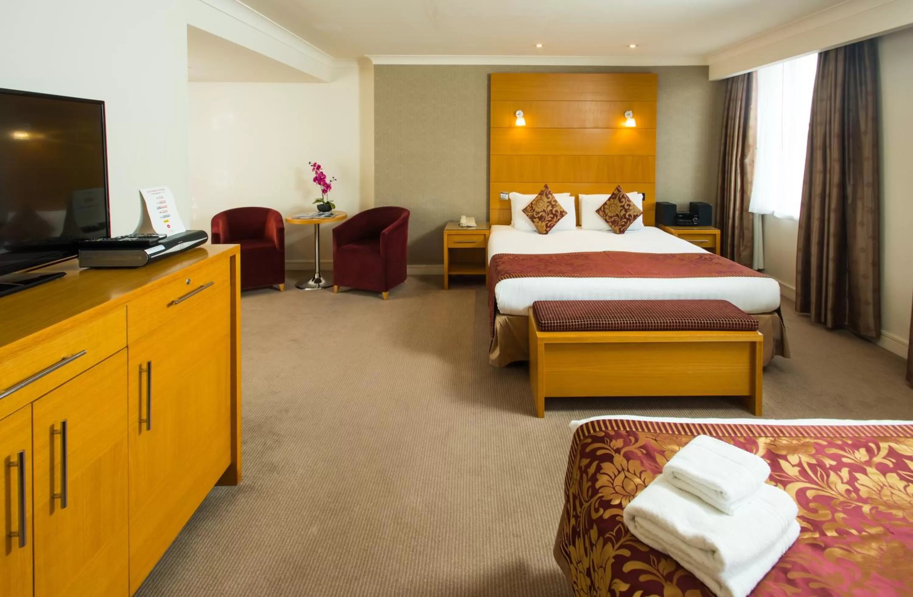 Bedroom, Bed in The Park City Grand Plaza Kensington Hotel