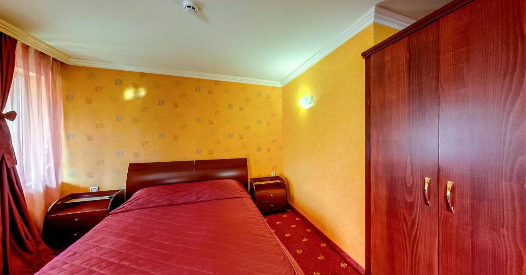 Bed in Troyan Plaza Hotel