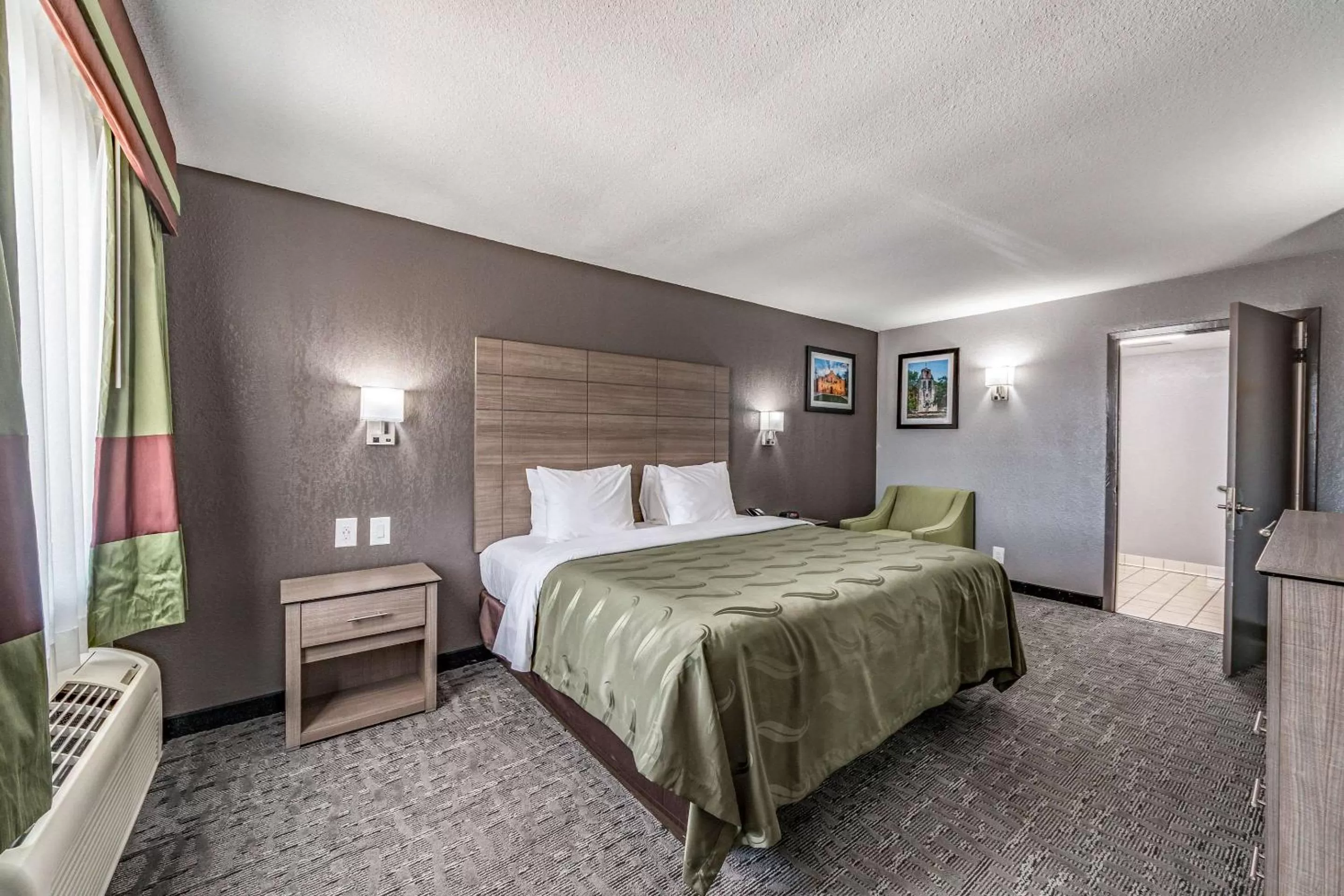 Photo of the whole room, Bed in Quality Inn I-10 East near Frost Bank Center