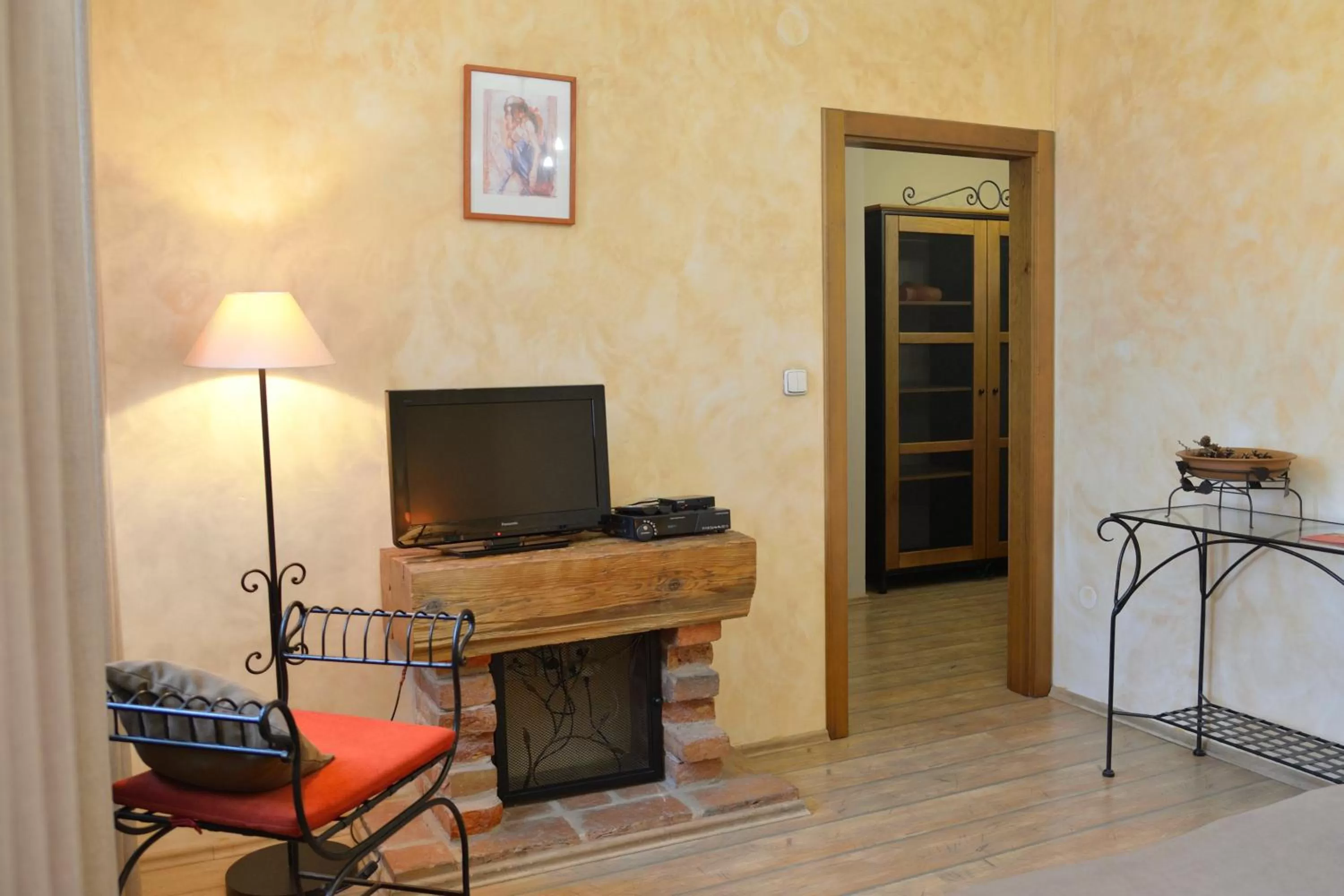 TV/Entertainment Center in Hotel and restaurant Via Ironia