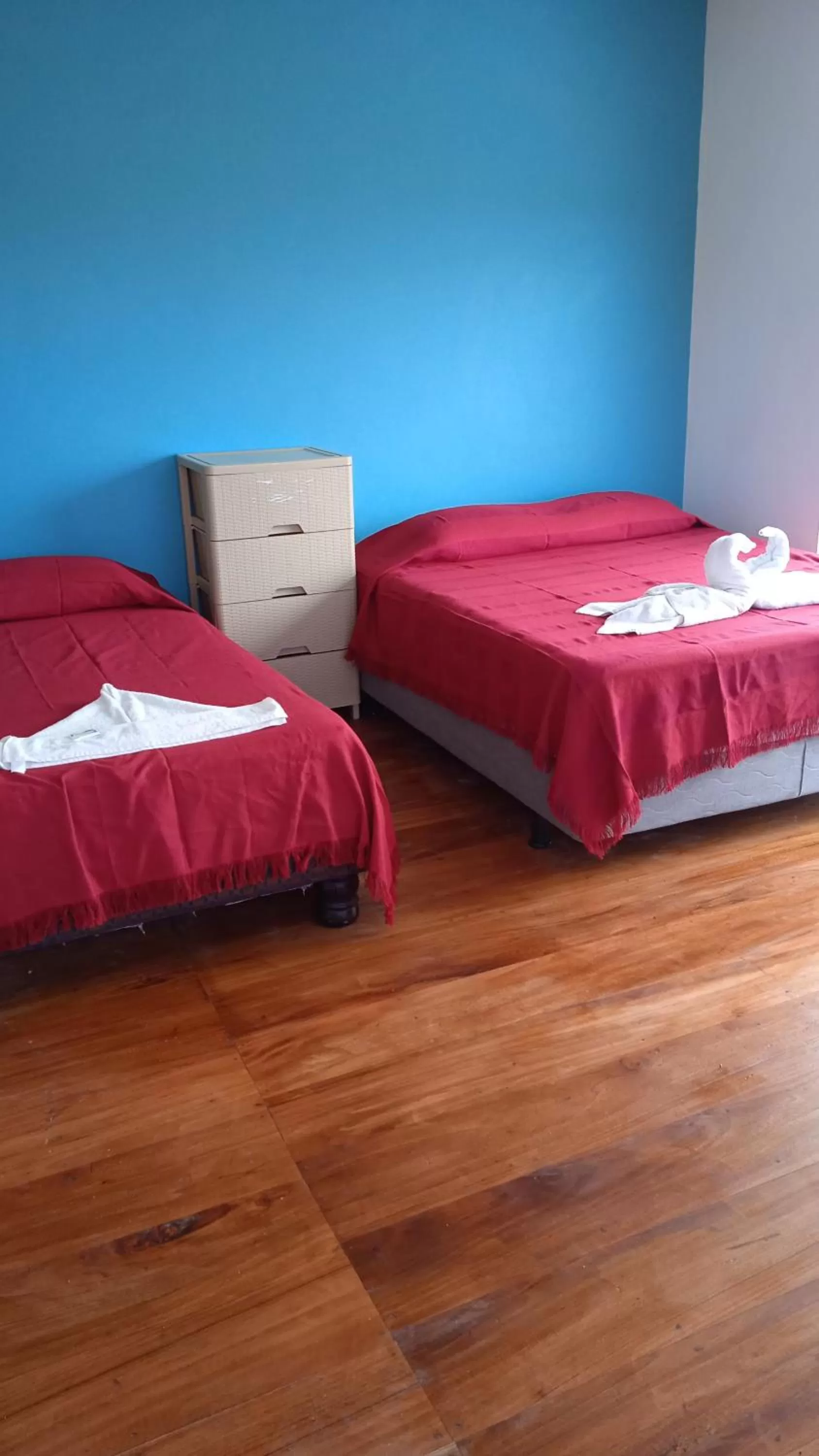 Bed in Hostal Cabañas Don Jorge