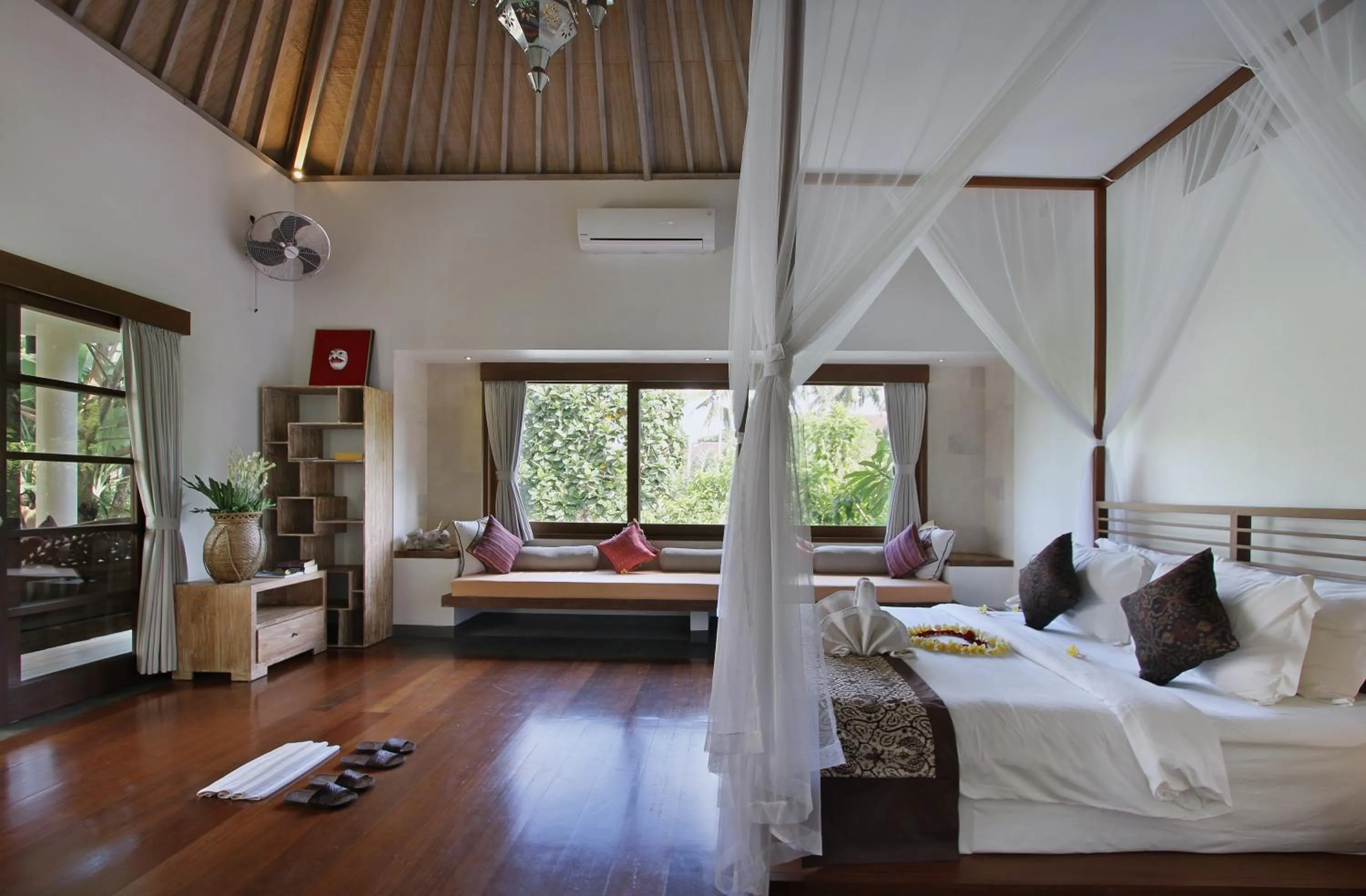 Bed in D'Legon Villas