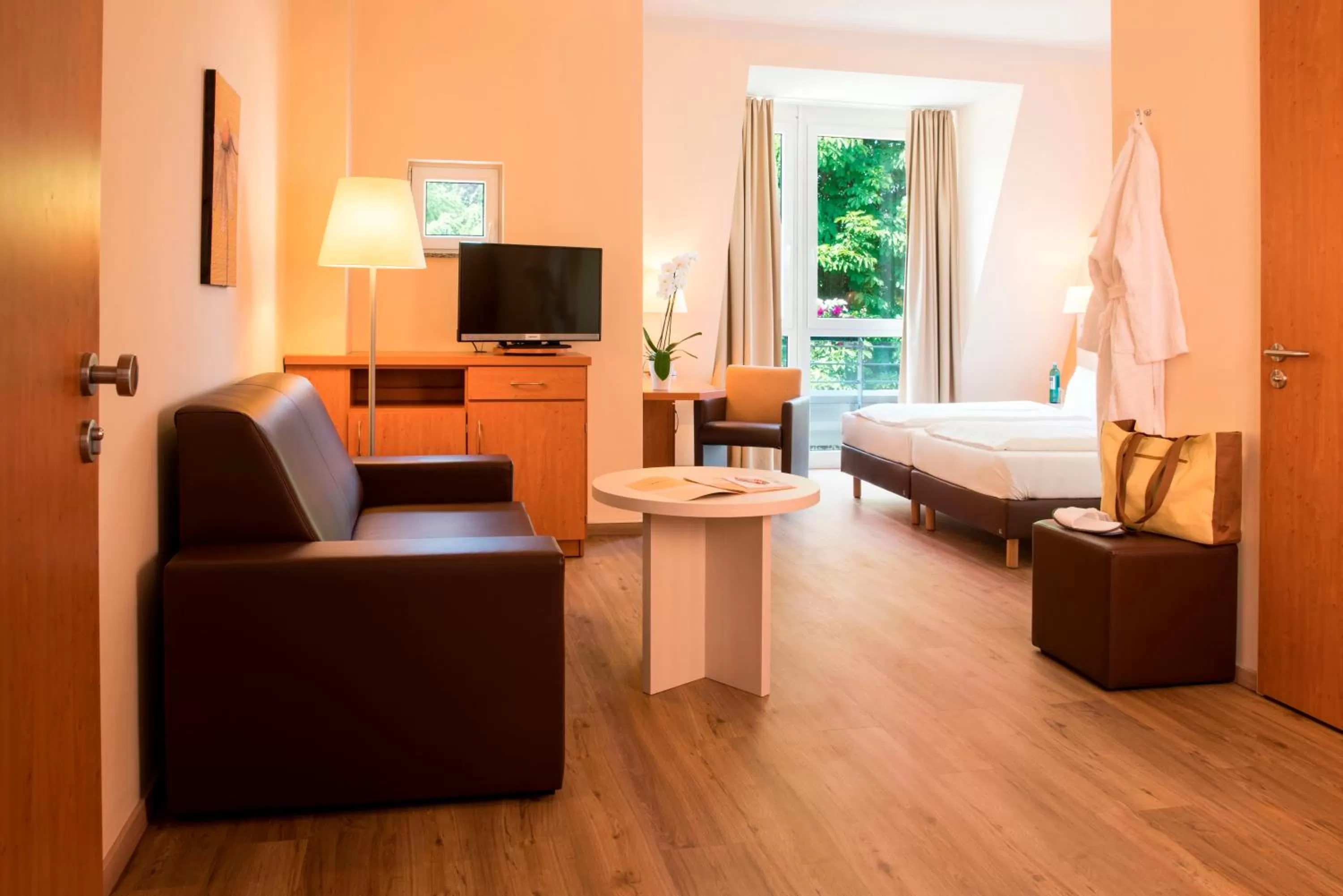 Photo of the whole room, Seating Area in Thermalis - Das Boardinghouse im Kurpark Bad Hersfeld