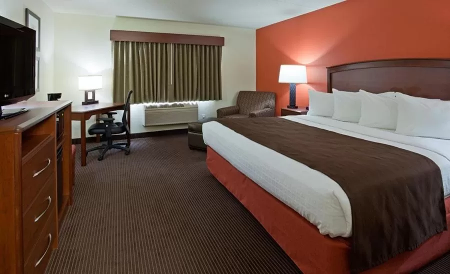 Bedroom, Bed in AmericInn by Wyndham Grafton