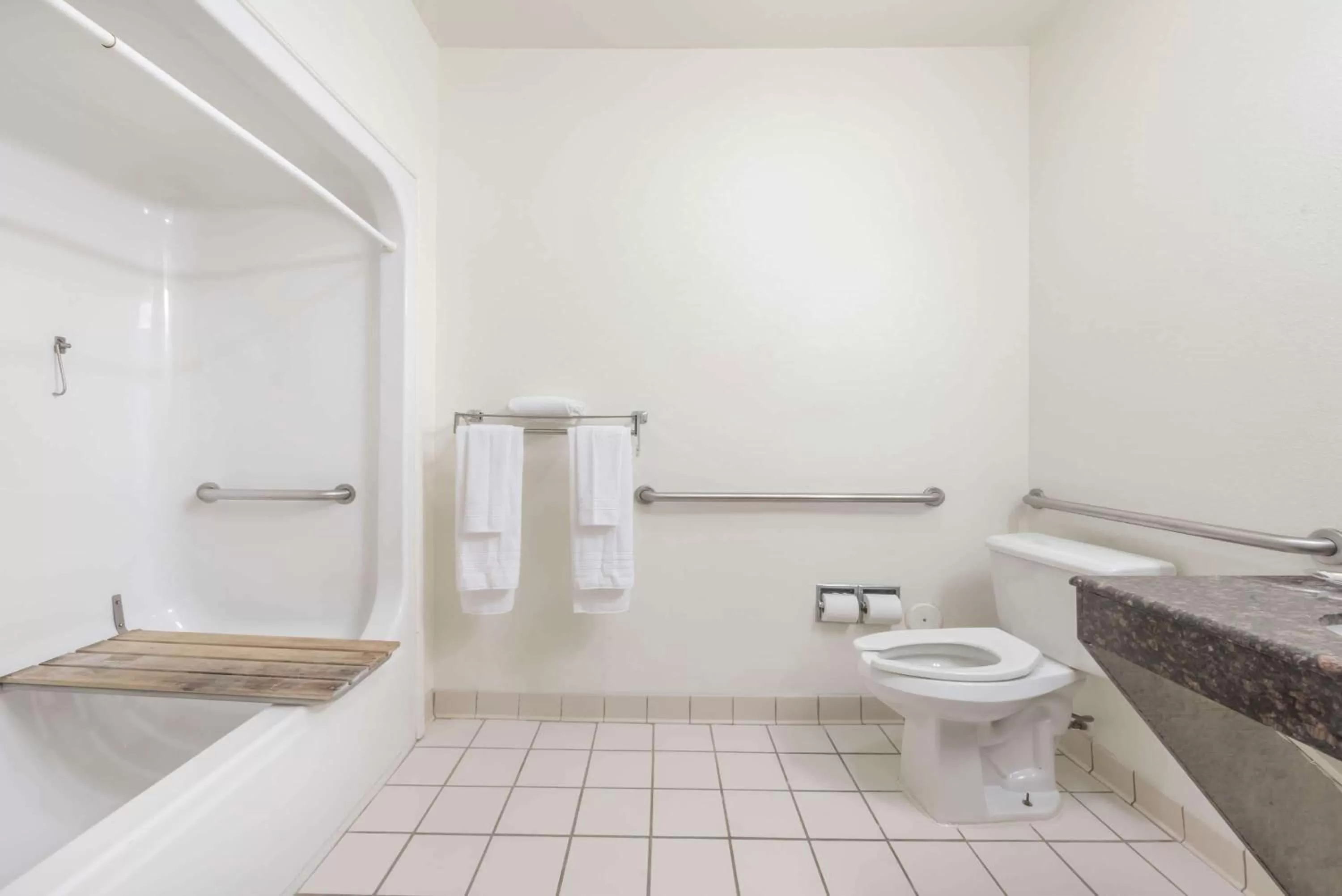 Bathroom in Super 8 by Wyndham Fort Worth Downtown South