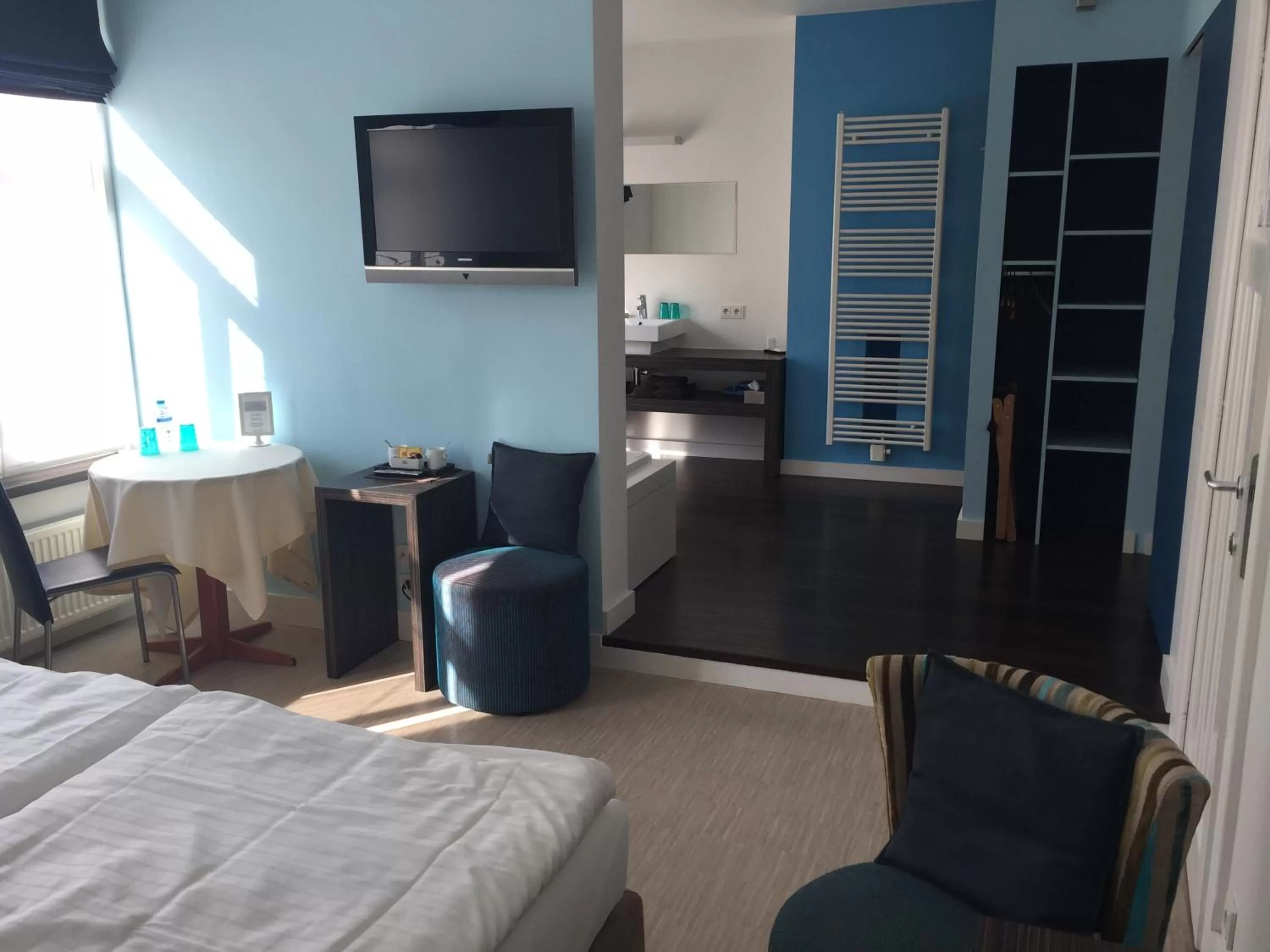 Photo of the whole room, TV/Entertainment Center in B&B Sabbajon