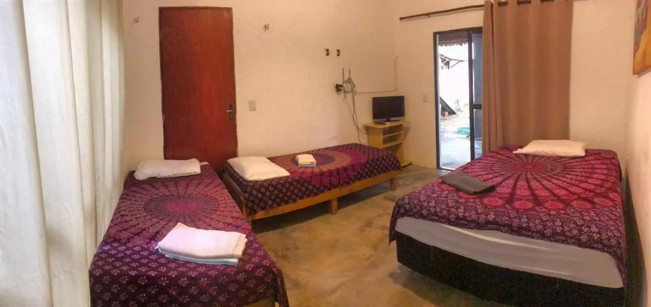 Bed in Pousada Casa de Vó