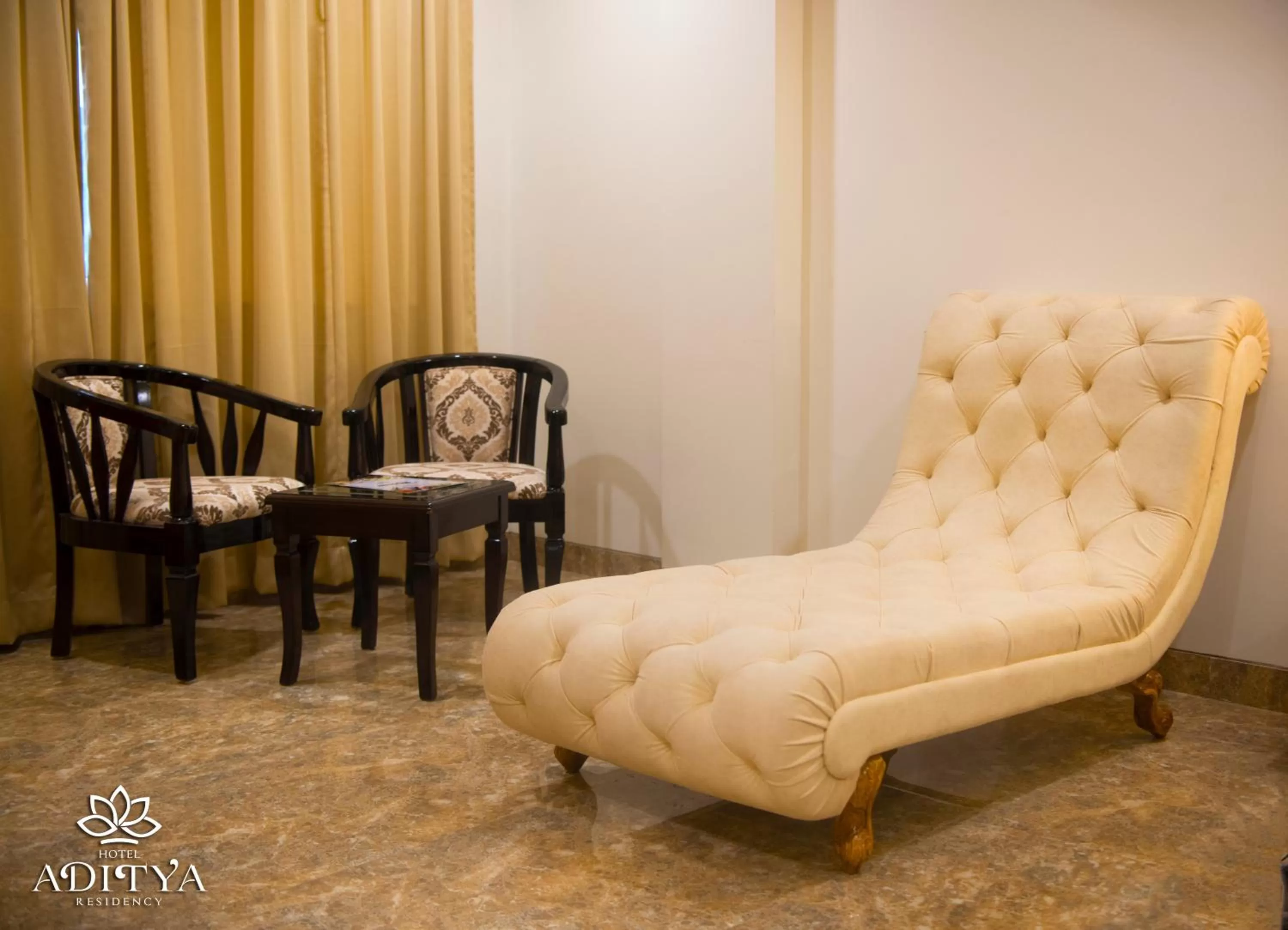 Seating area in Hotel Aditya Residency