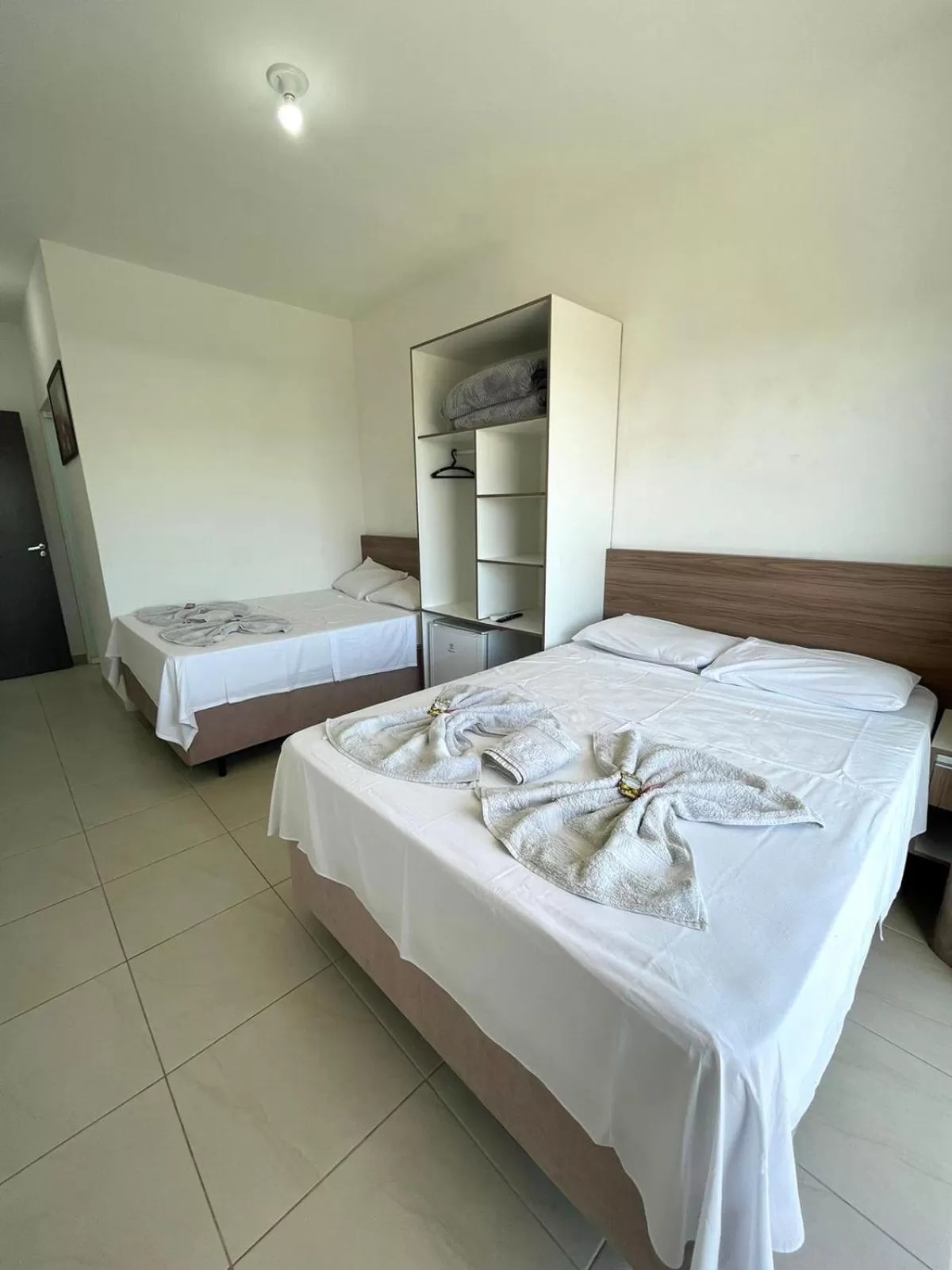 Bed in Pousada Vó Dena