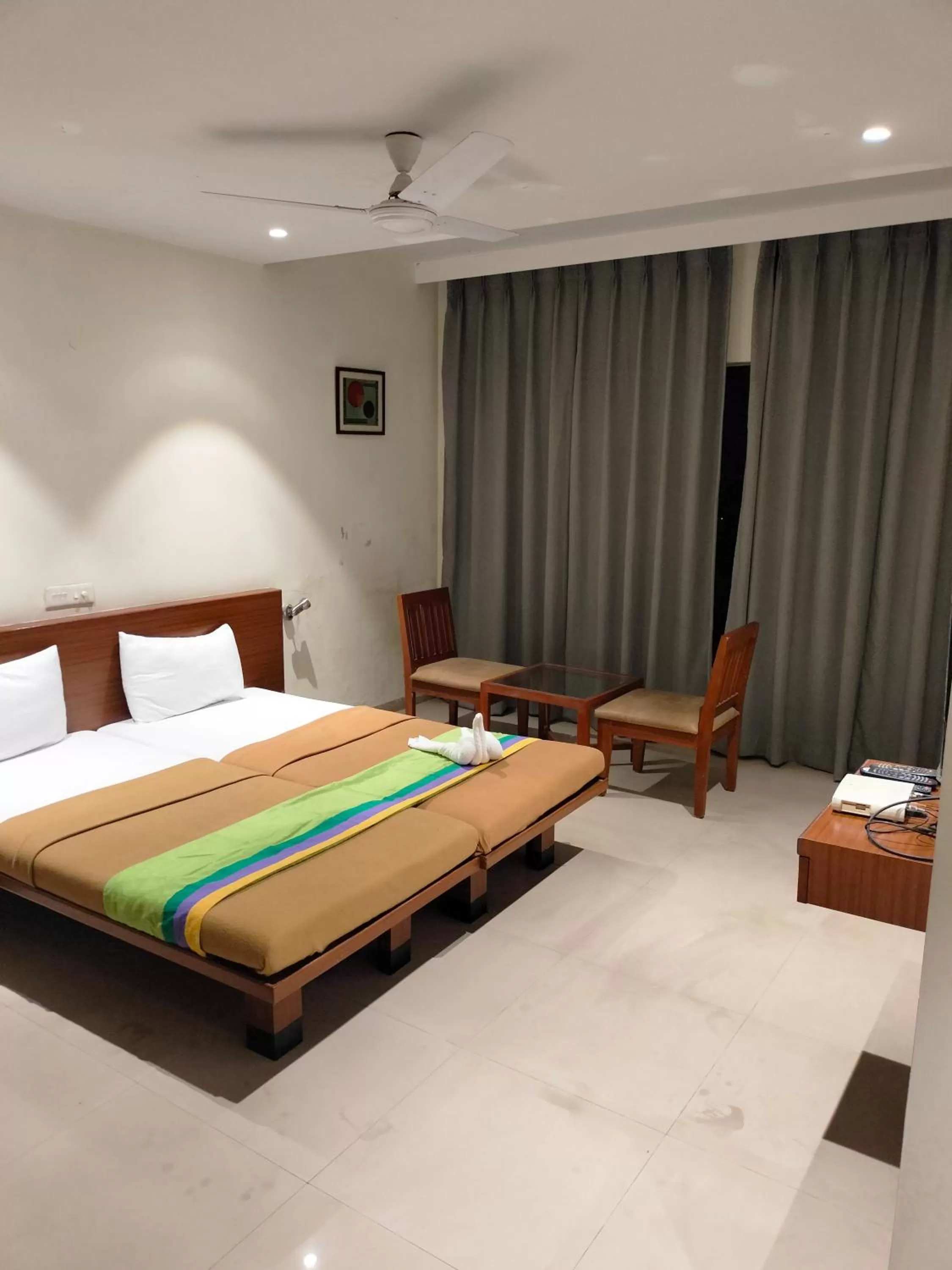 Bed in Hotel Sumanchandra Suites