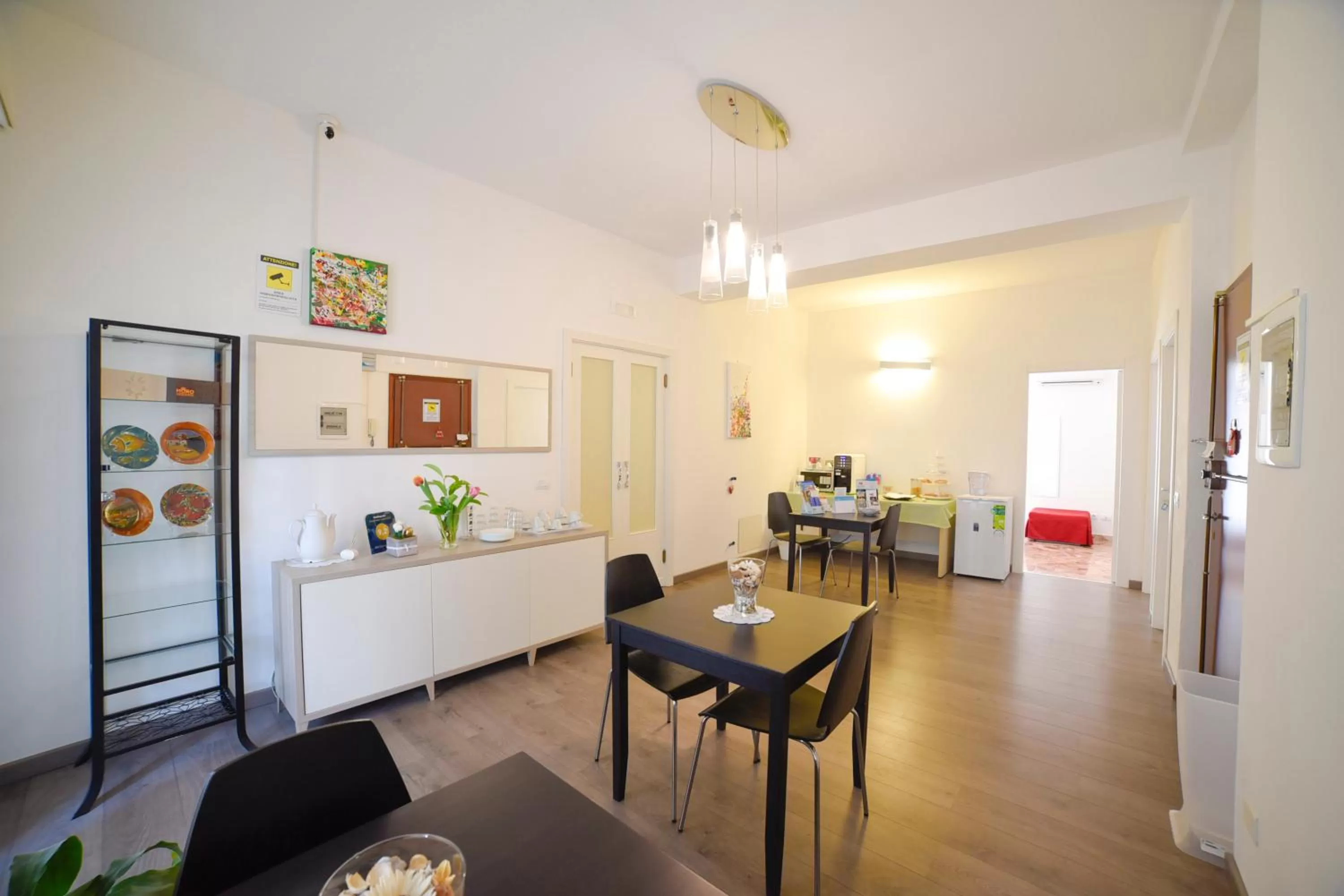 Communal lounge/ TV room in B&B Siracusa Holidays