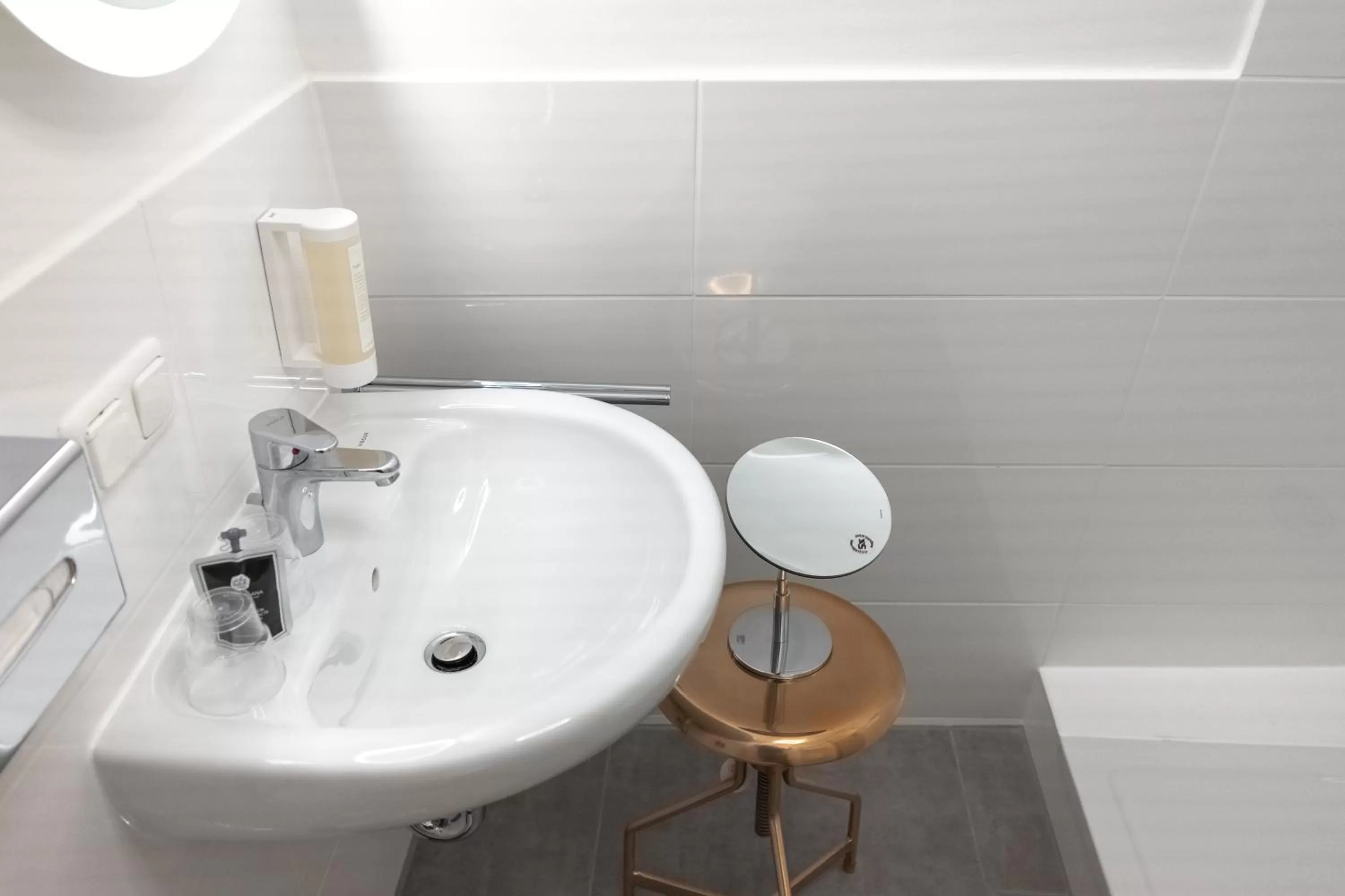 Bathroom in ANA Living Augsburg City Center by Arthotel ANA - Self-Service-Hotel