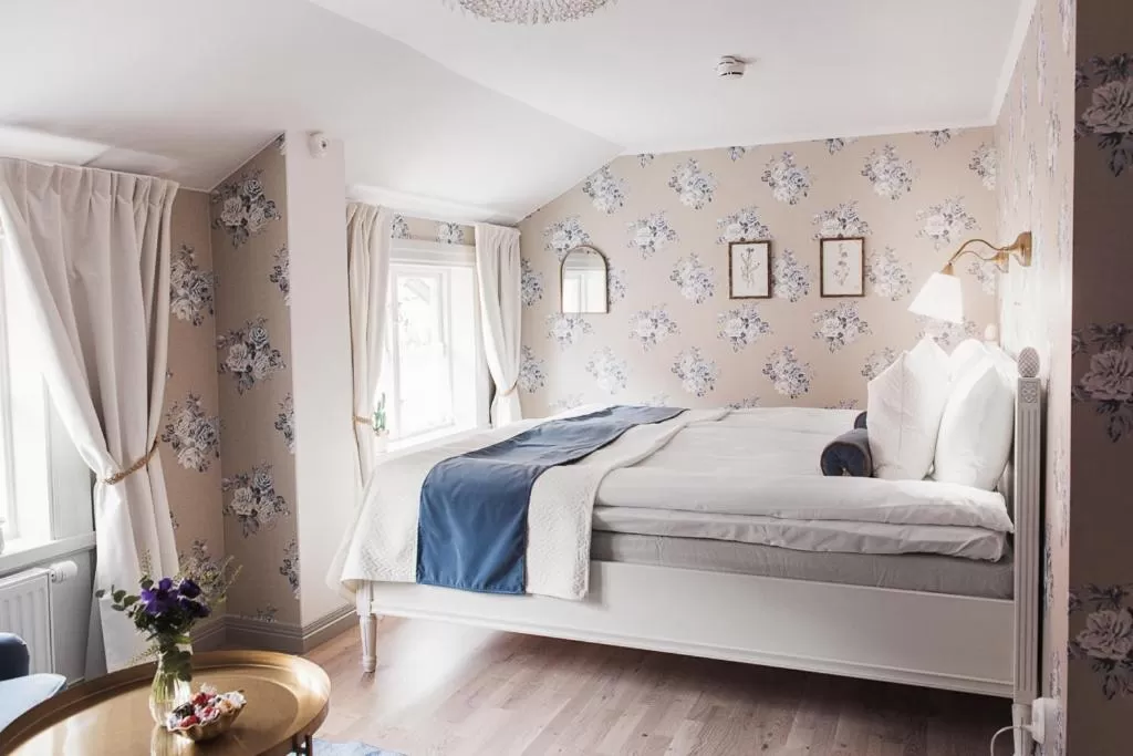 Bed in Hilma Winblads Bed & Breakfast