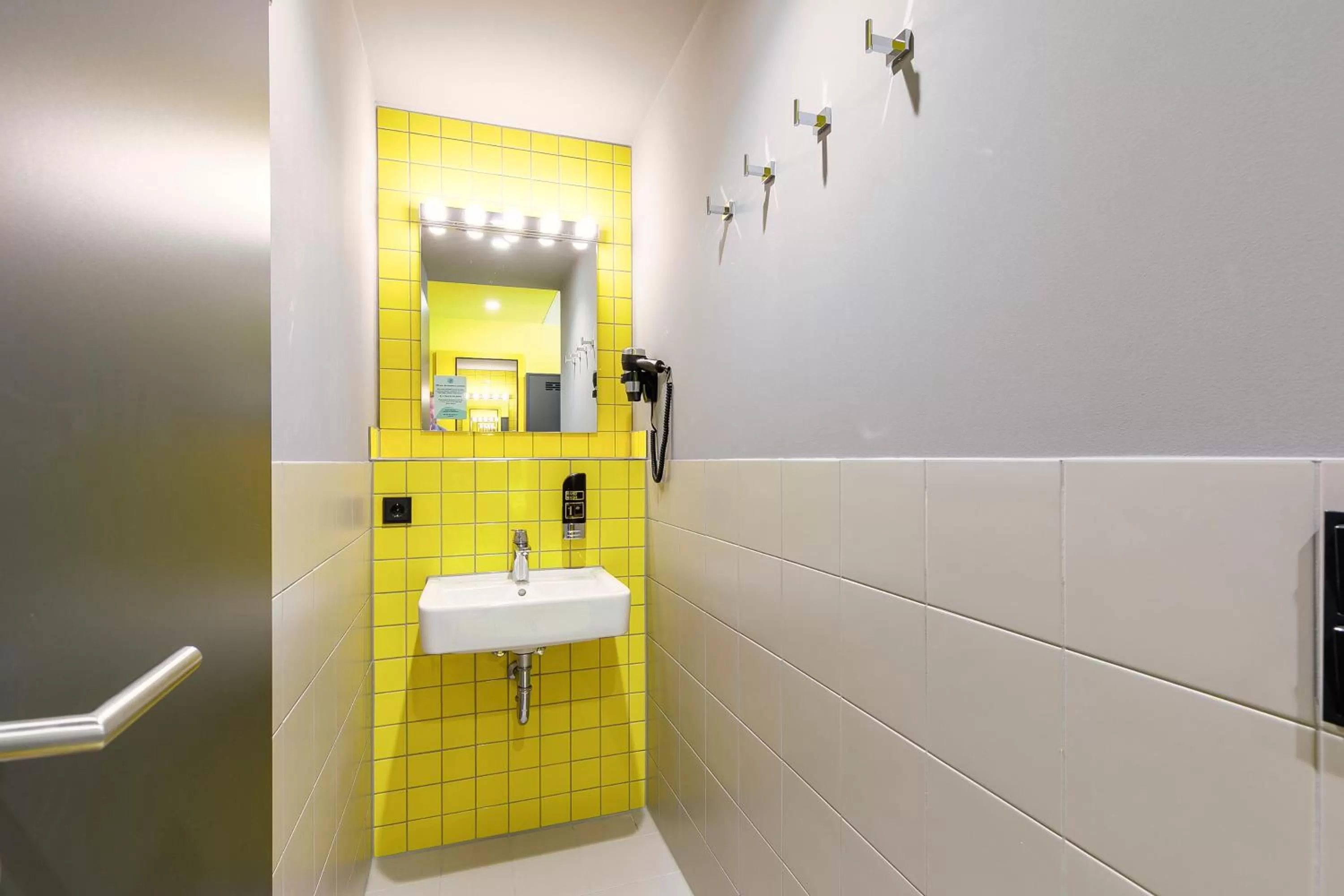 Bathroom in MEININGER Hotel Dresden Zentrum