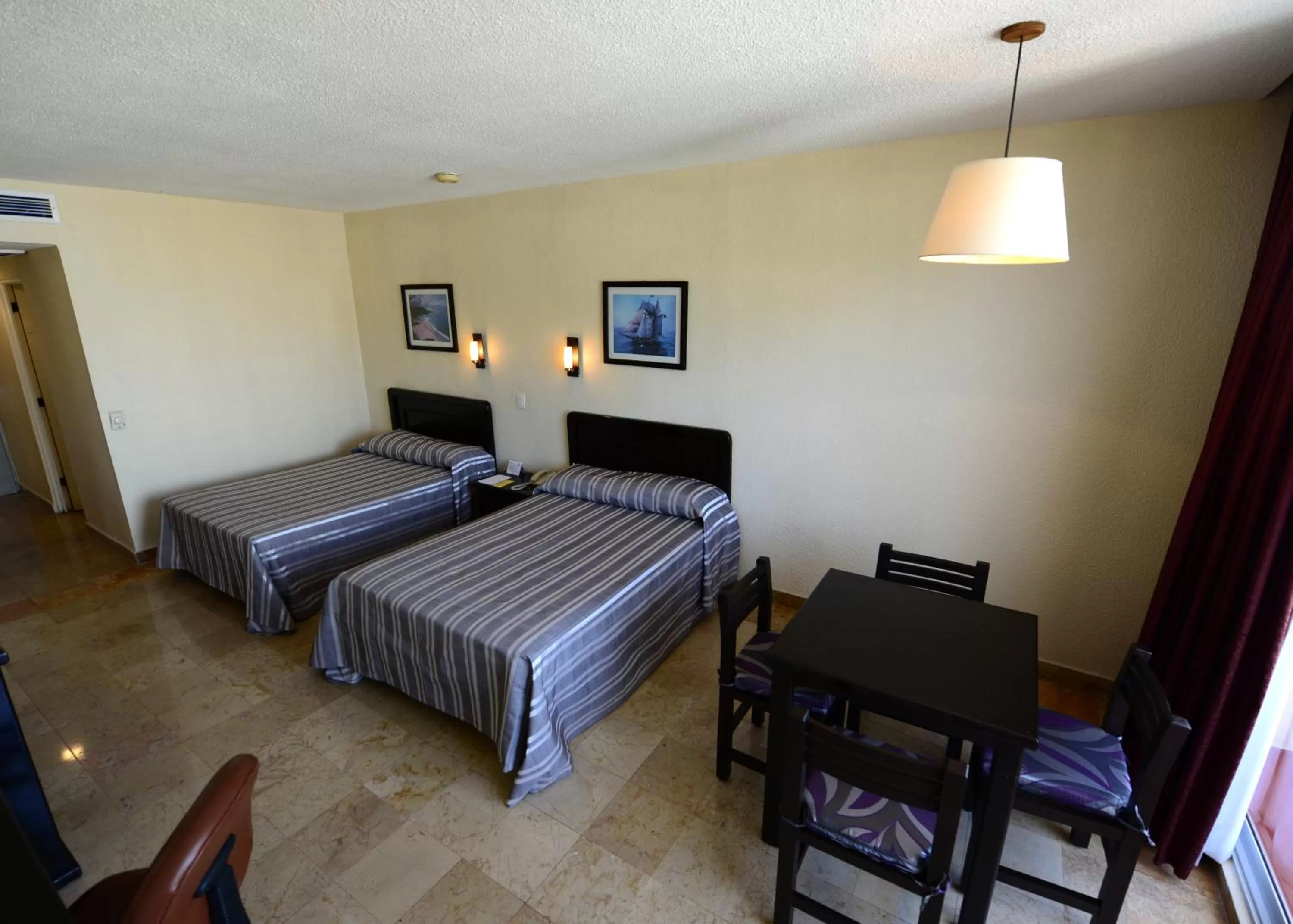 Photo of the whole room, Bed in Amarea Hotel Acapulco