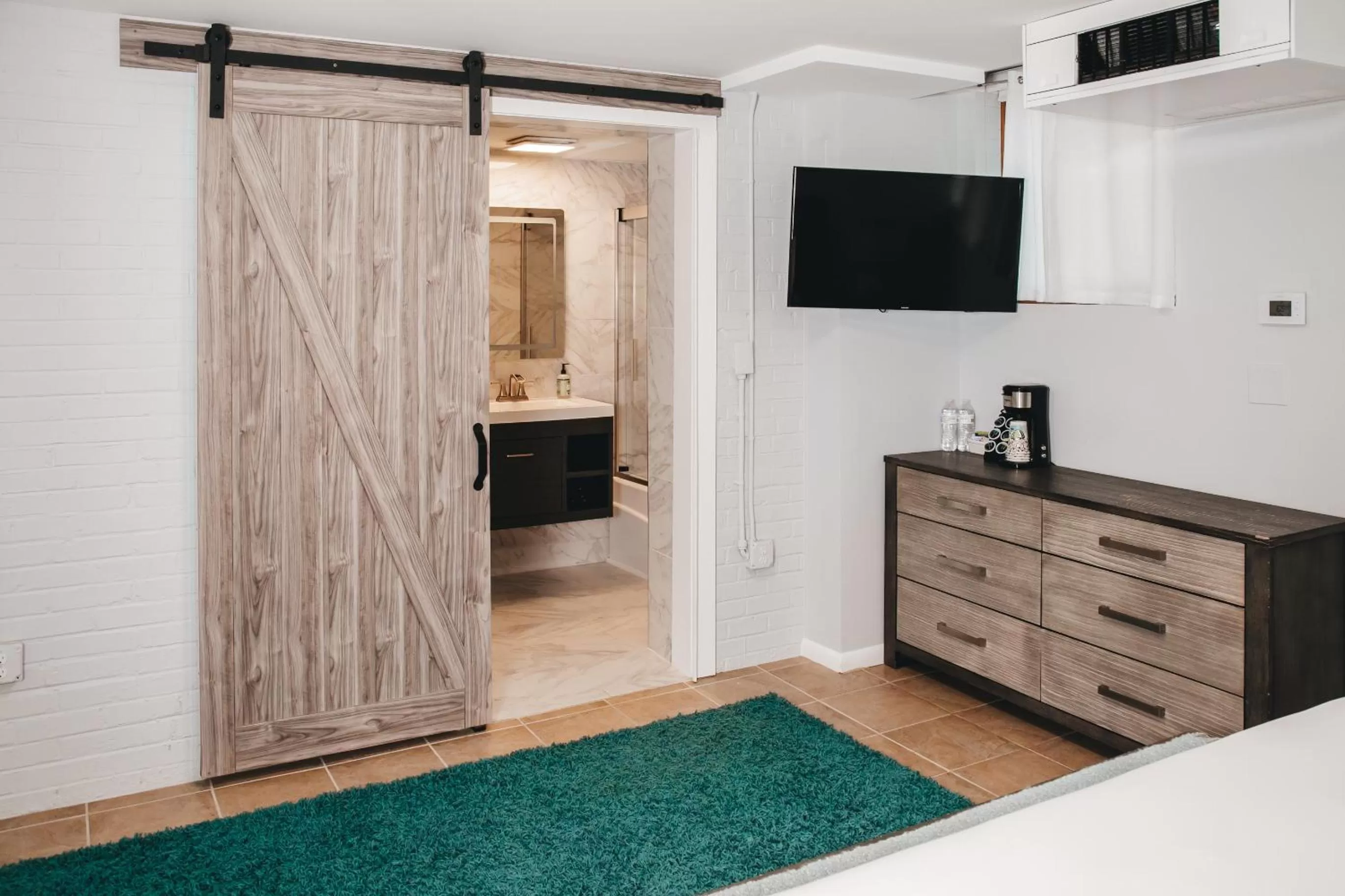 Bed in SKYLARANNA Resort & SPA