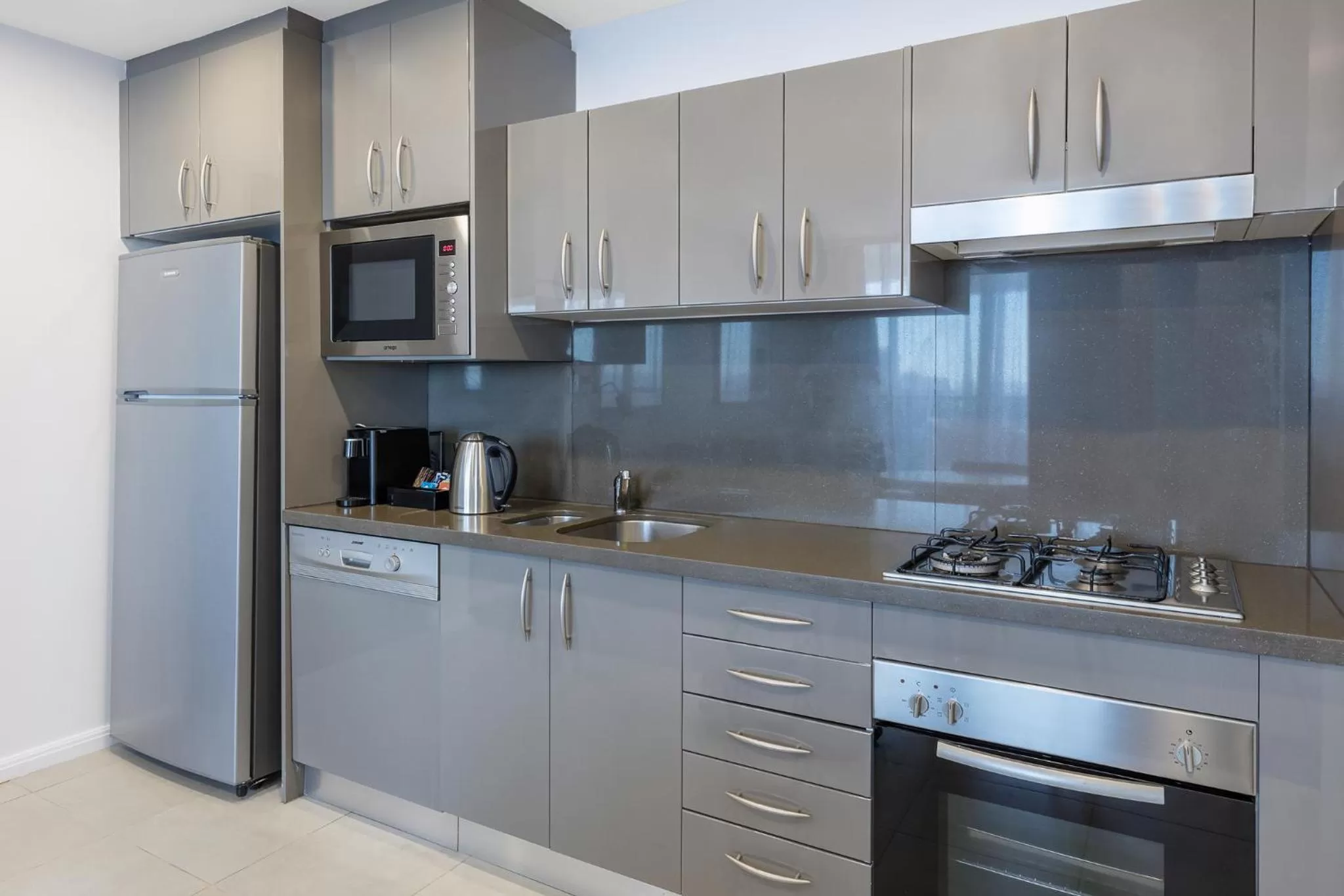 Kitchen or kitchenette in Meriton Suites Kent Street, Sydney