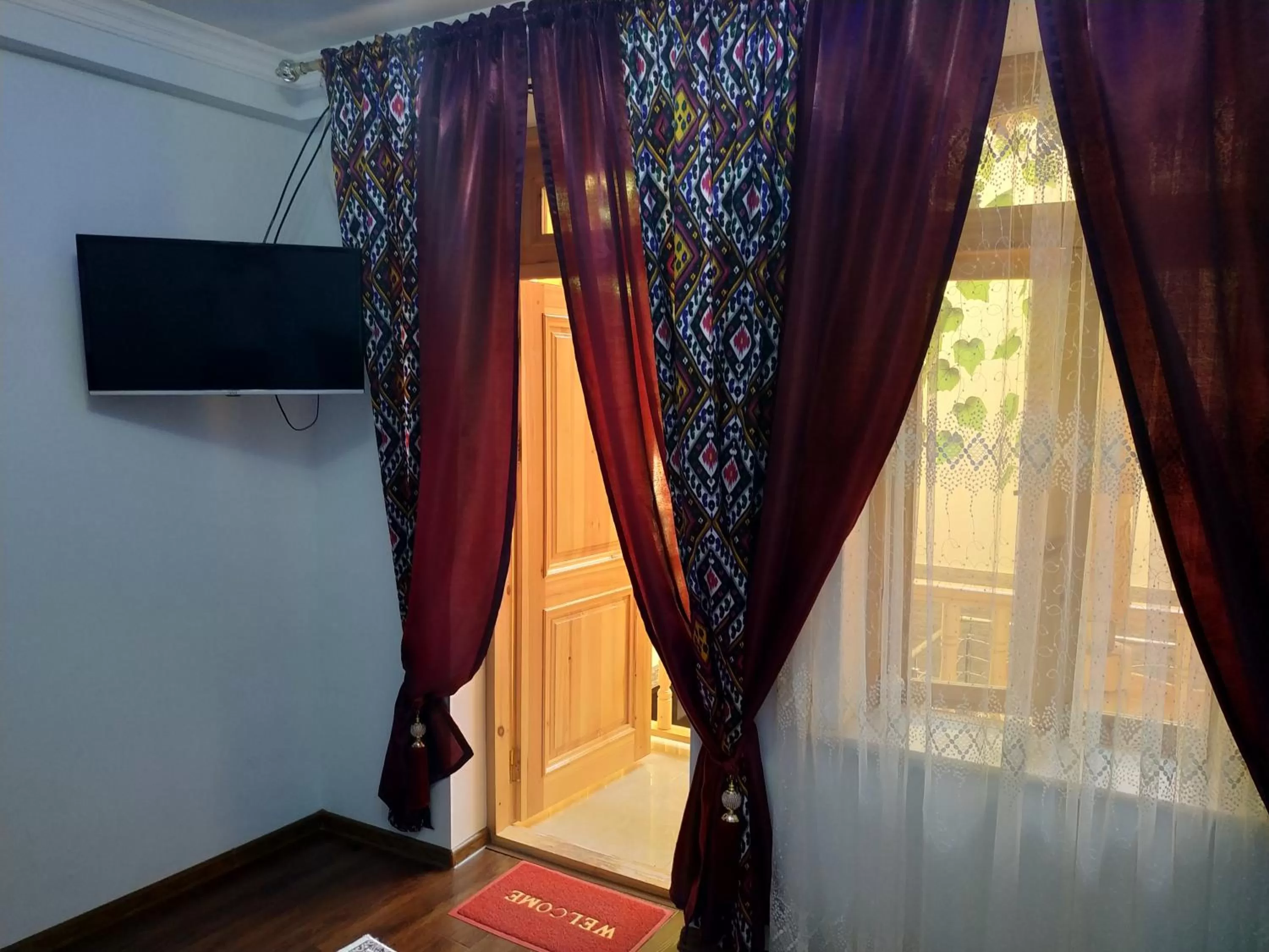 TV/Entertainment Center in Tilyakori Hotel