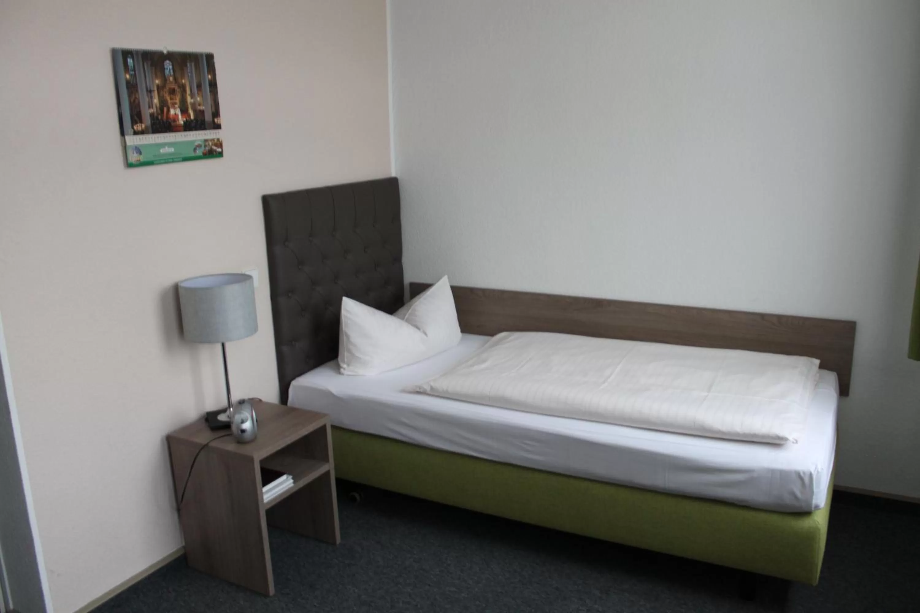 Bed in Hotel Sächsischer Hof