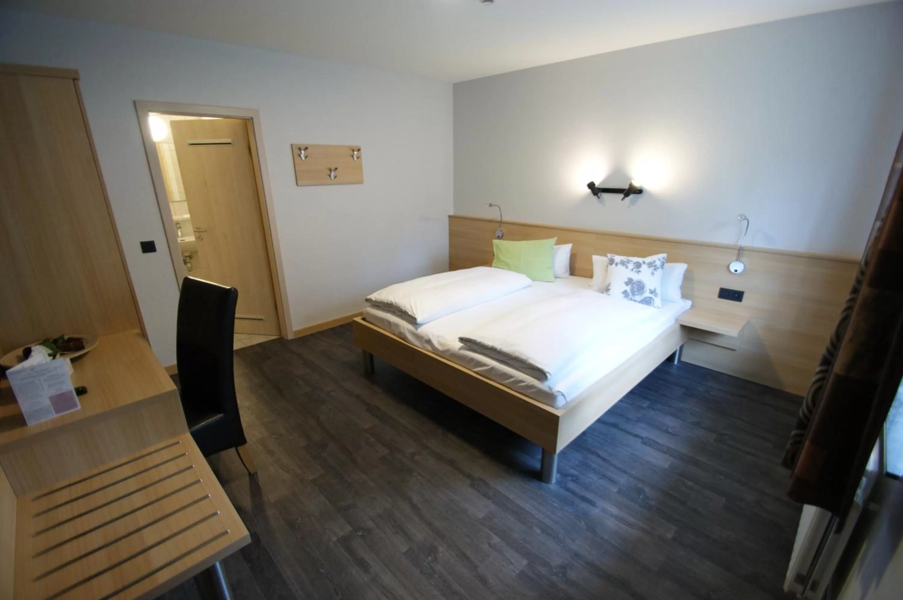 Bedroom, Bed in Hotel Restaurant Tychon AG