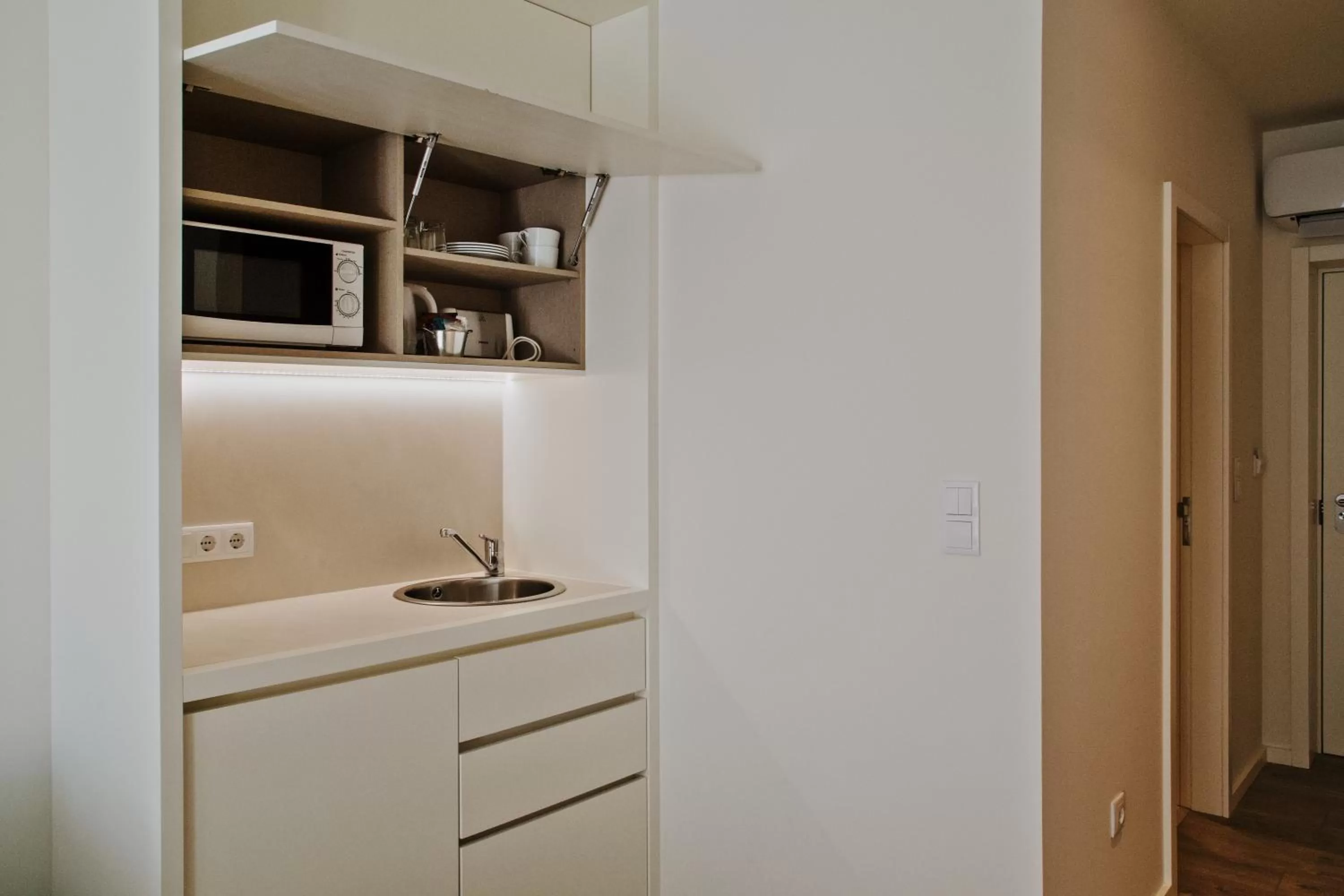 Kitchen or kitchenette in Hotel Spot Family Suites