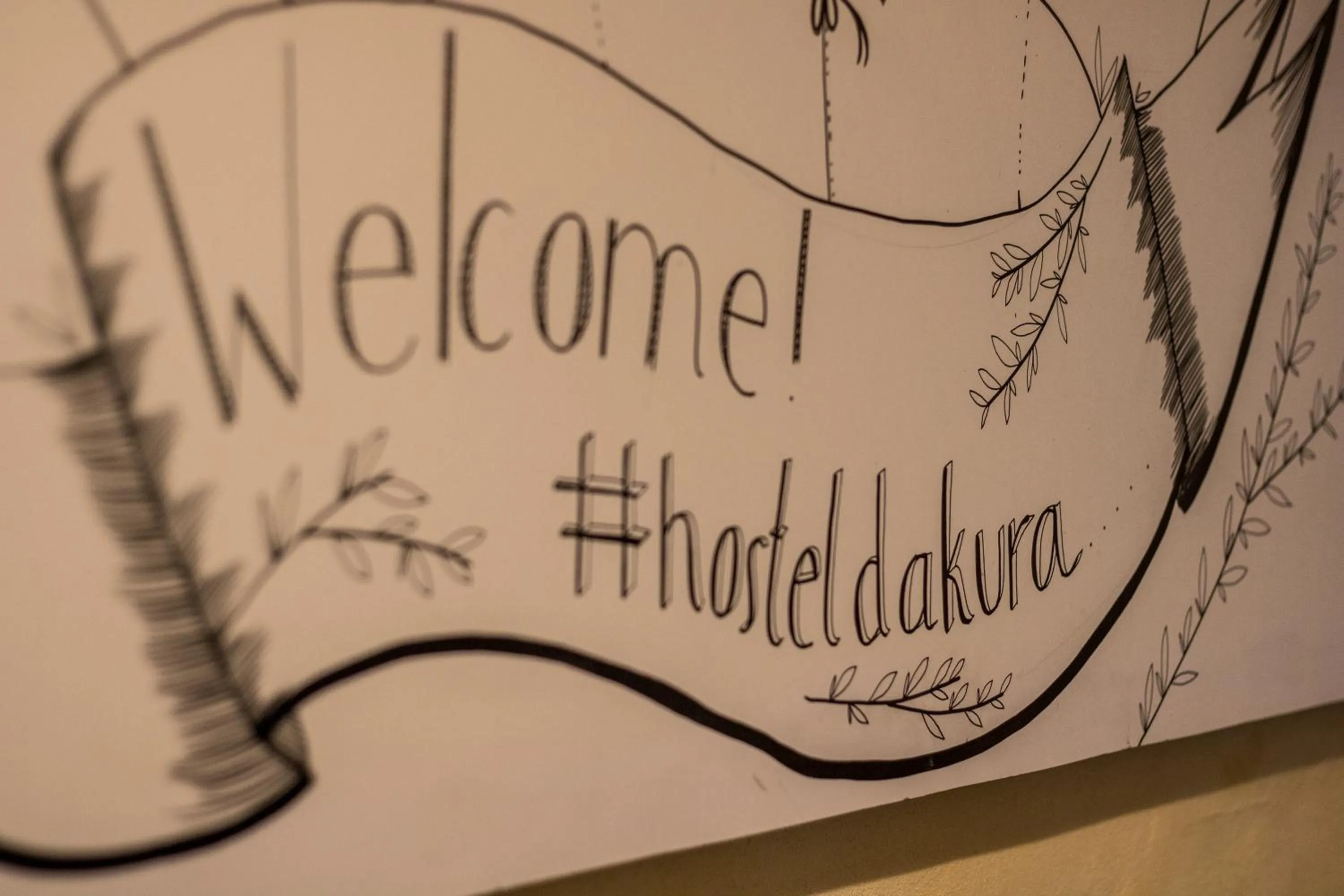 Property logo or sign in Hostel Dakura