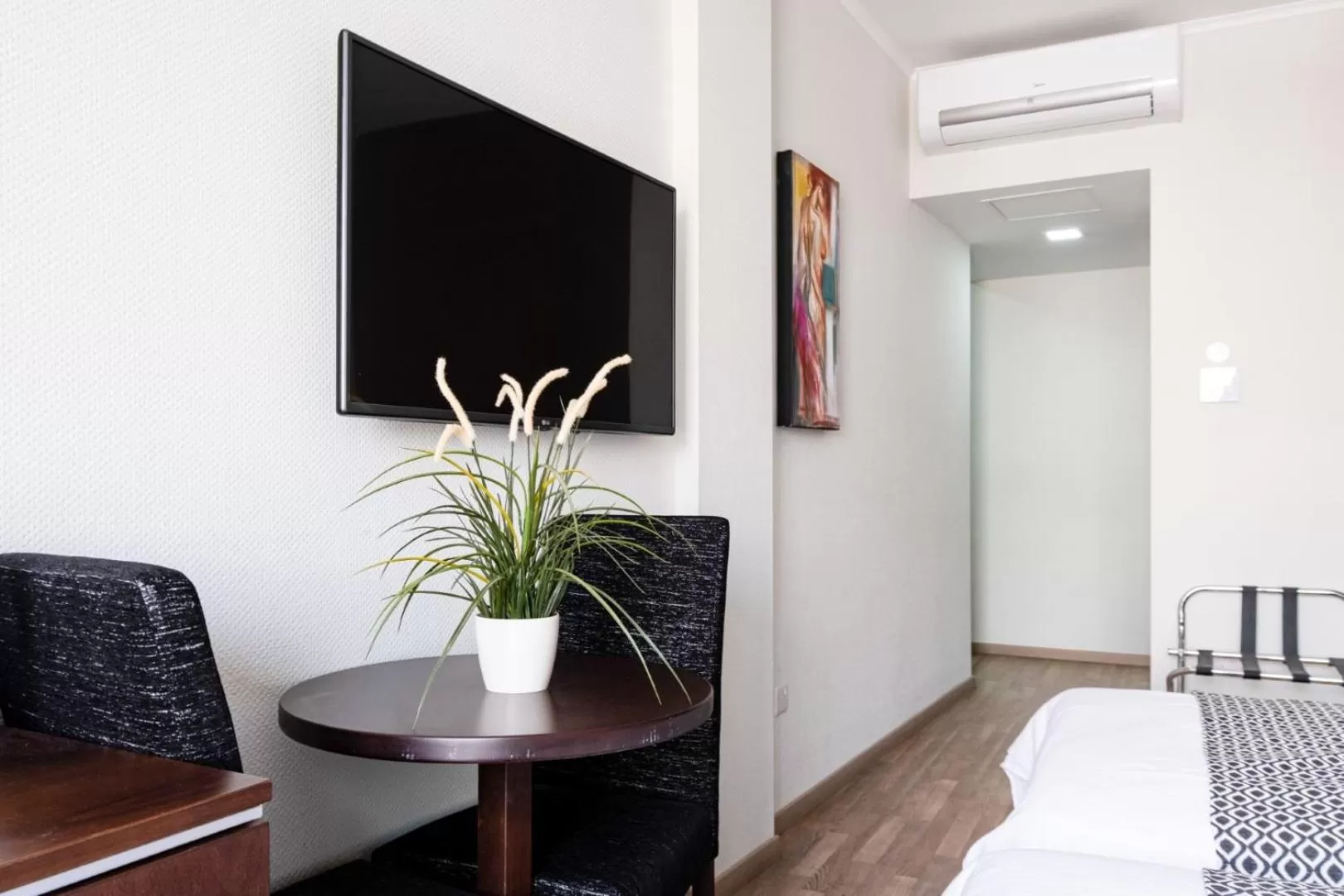 Bed in Livadhiotis City Hotel