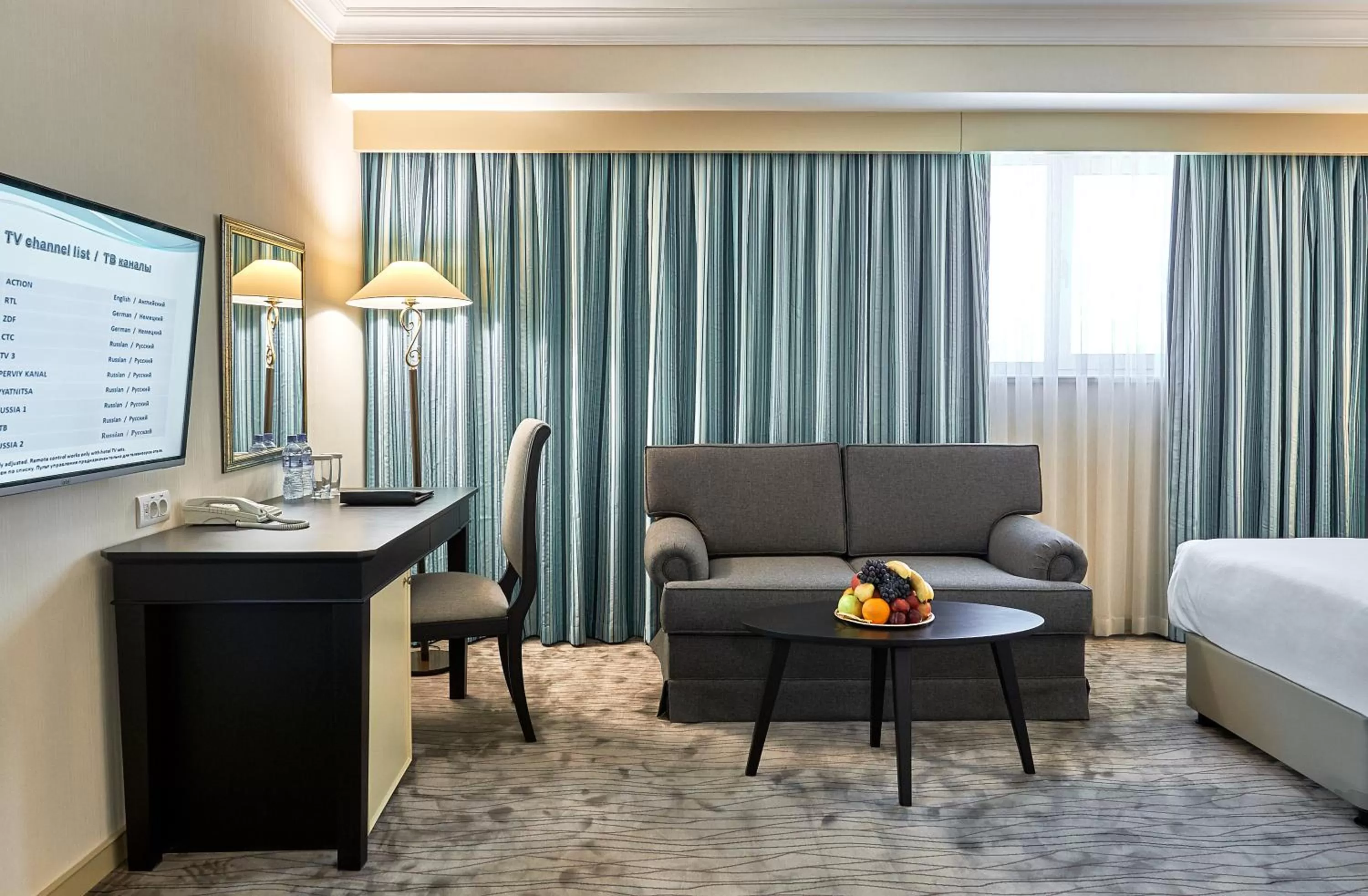 Seating area, Bed in Wyndham Tashkent