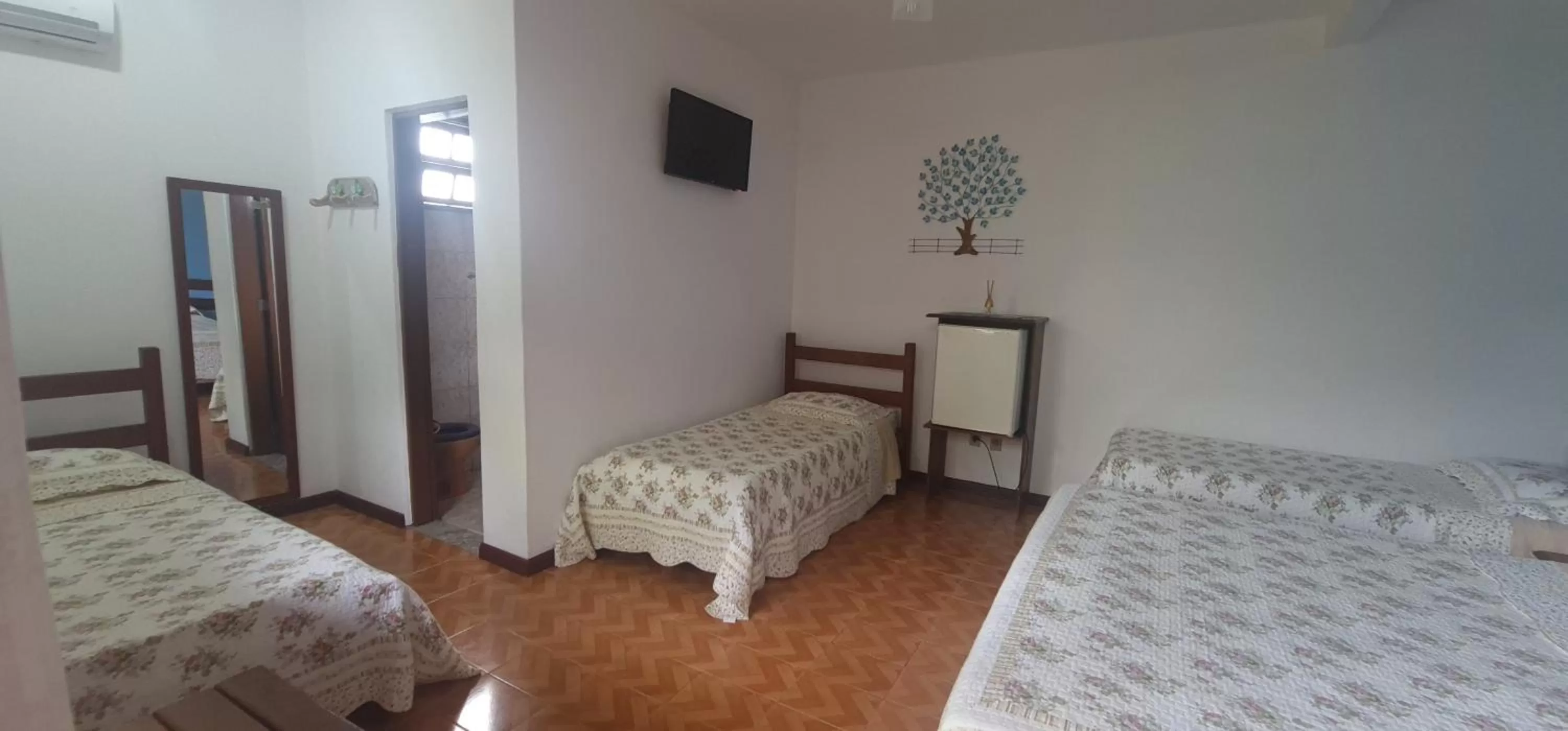 Bed in Pousada Flor de Paraty