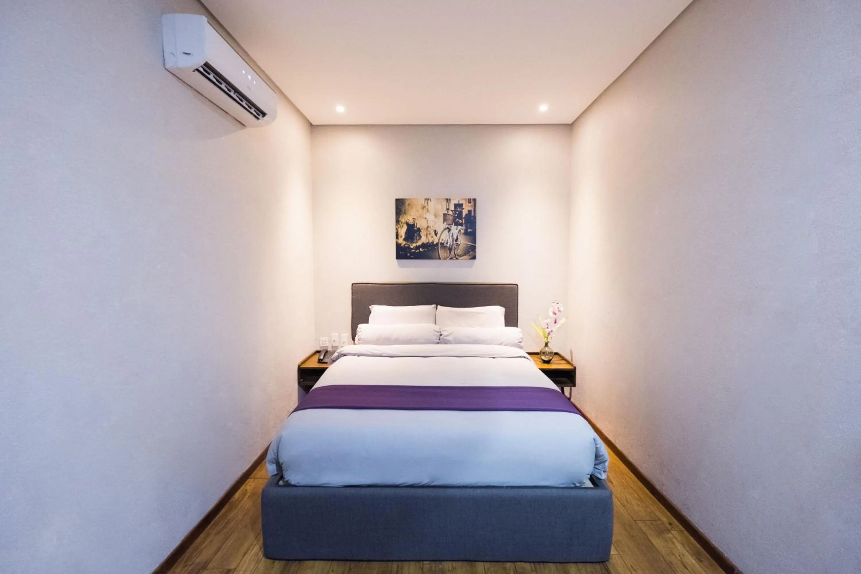 Bedroom in Axiaa Hotel