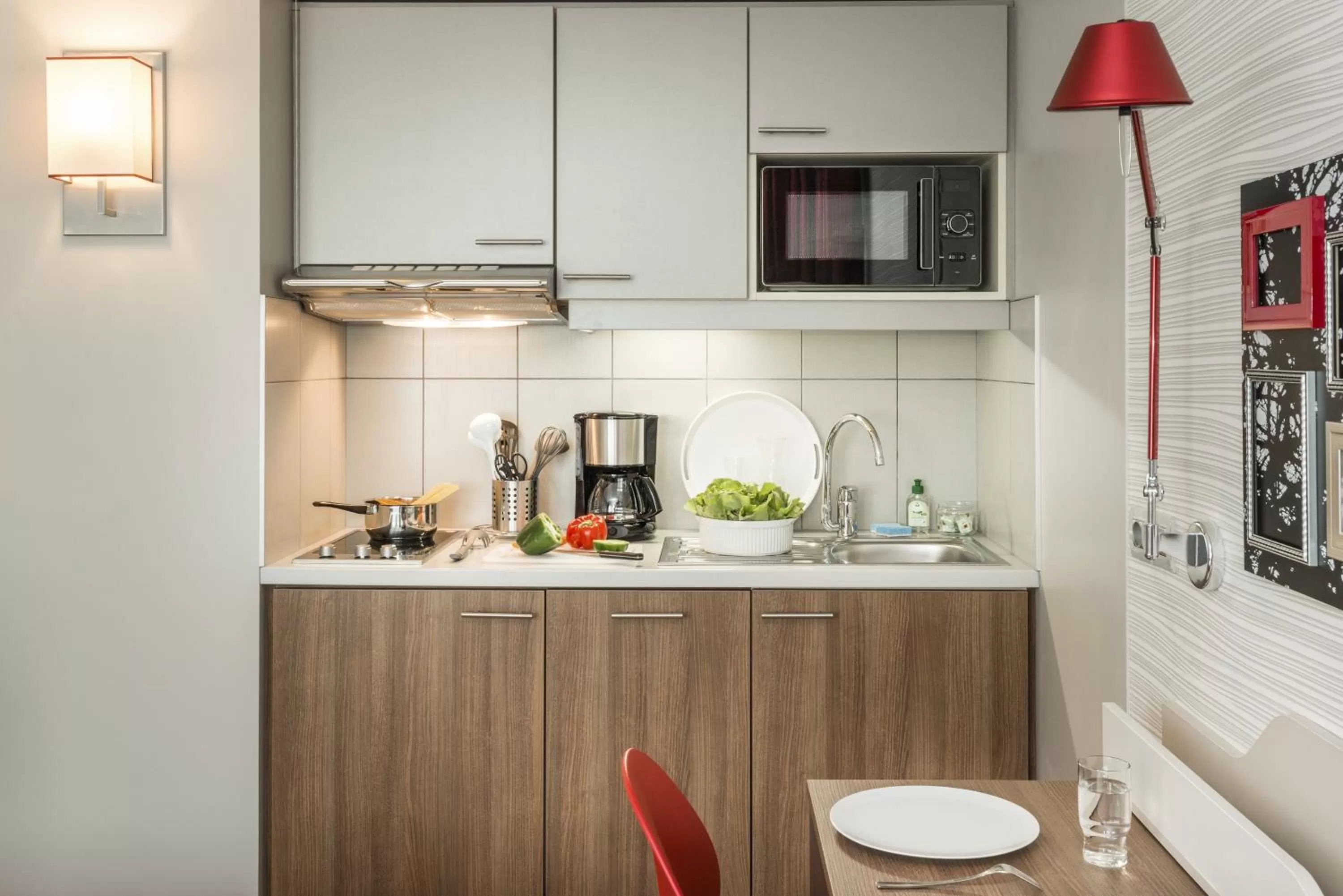 Kitchen or kitchenette in Aparthotel Adagio Birmingham City Centre