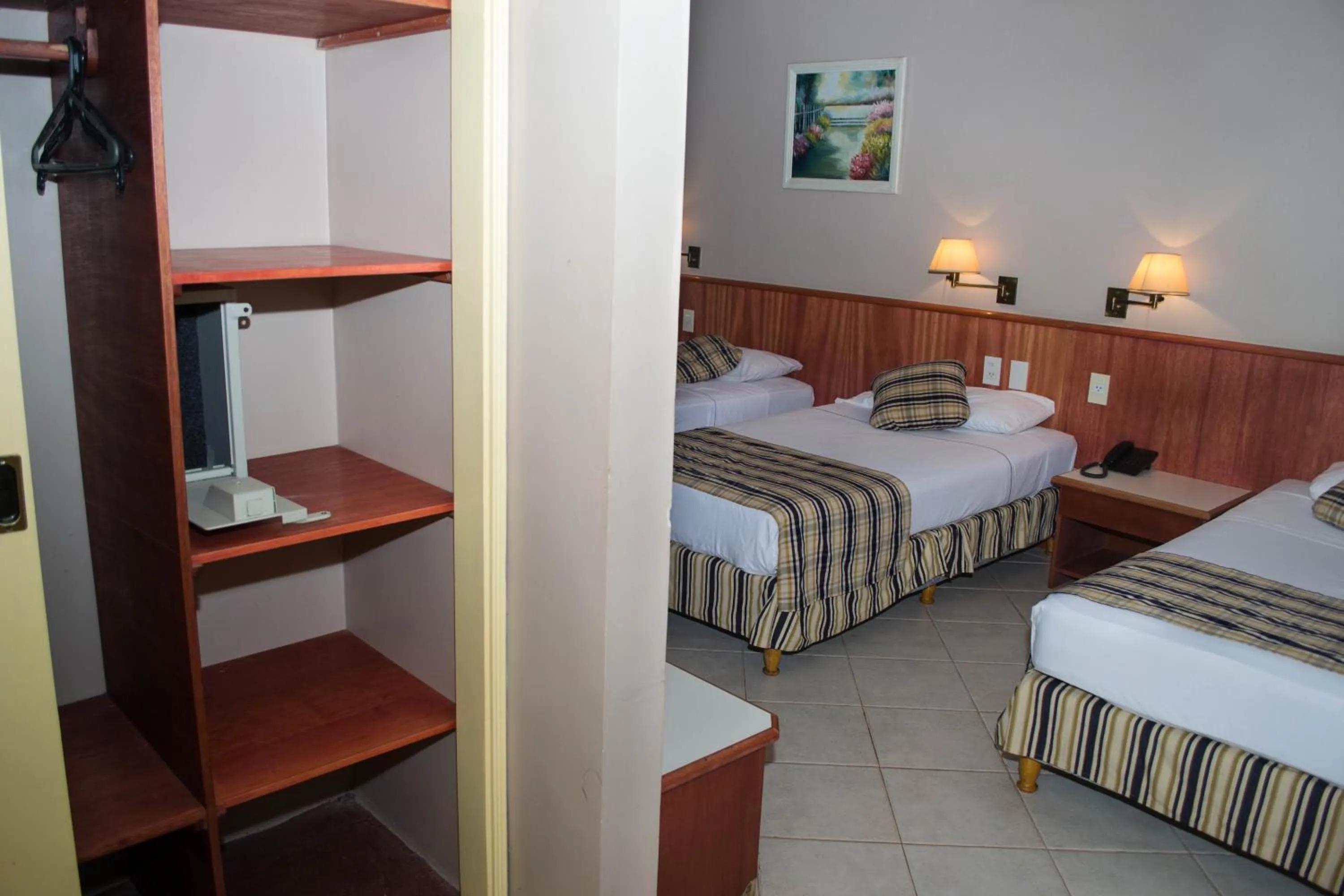 Bed in Marcopolo Suites Iguazu