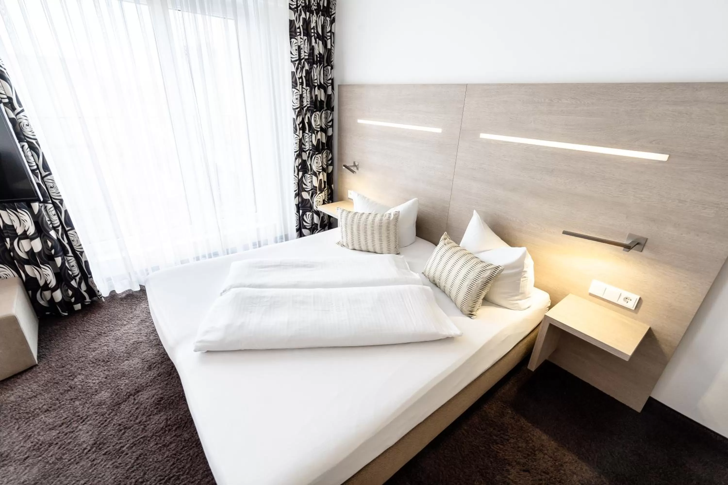 Bed in Hotel Demas City