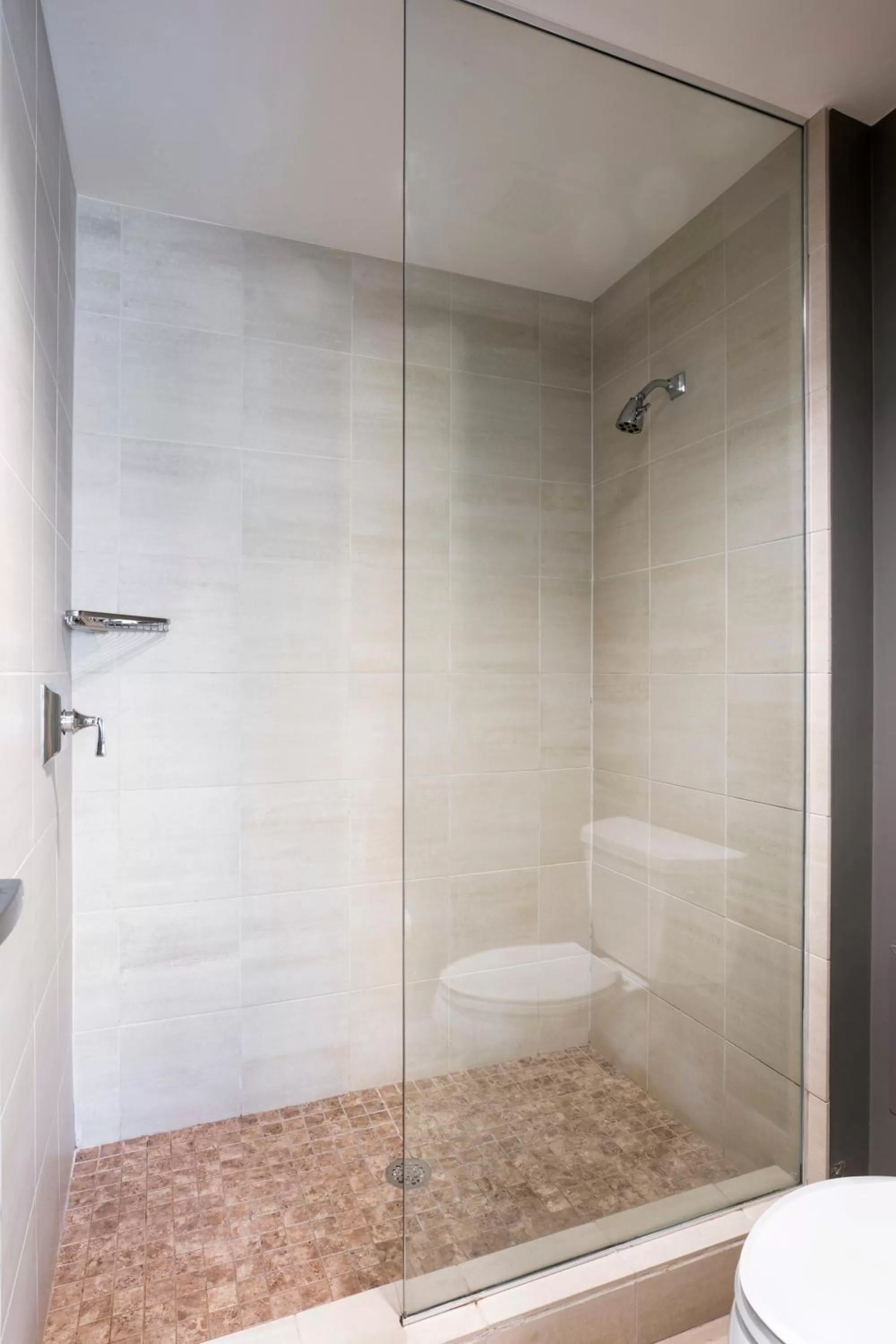 Shower in Colcord Hotel Oklahoma City, Curio Collection by Hilton