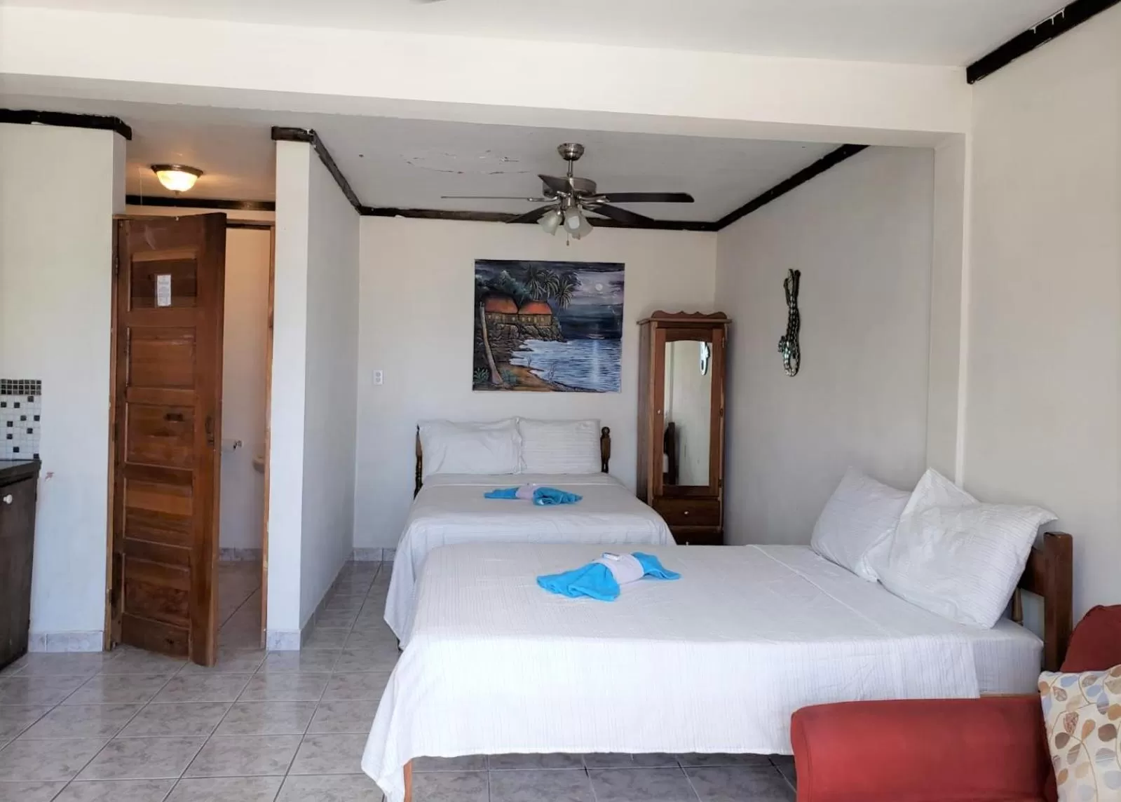 Bed in Beach Side Condos Caye Caulker by CCVH