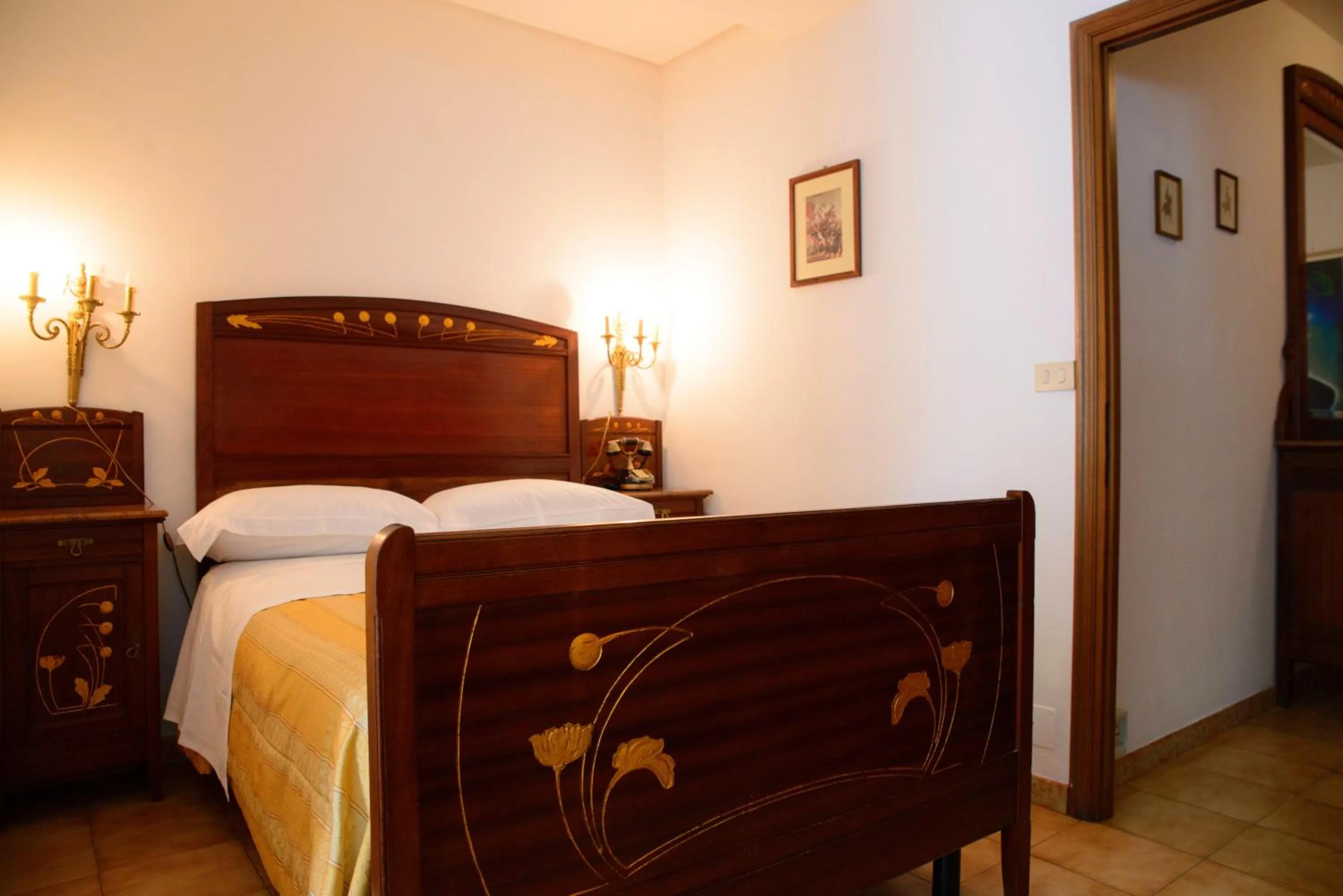 Photo of the whole room in Affittacamere Maison Napoleon