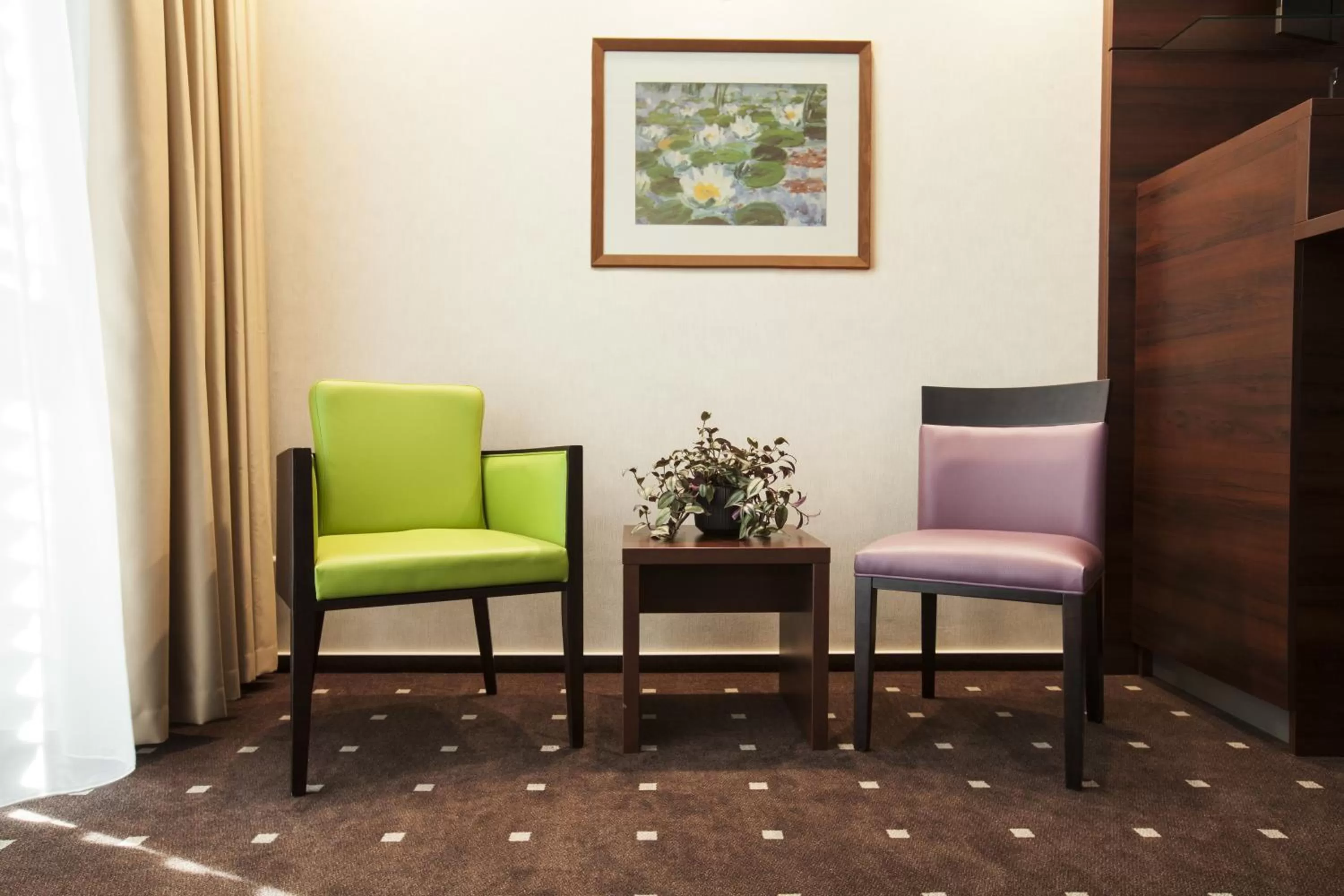 Seating area in Aparthotel DeLuxe