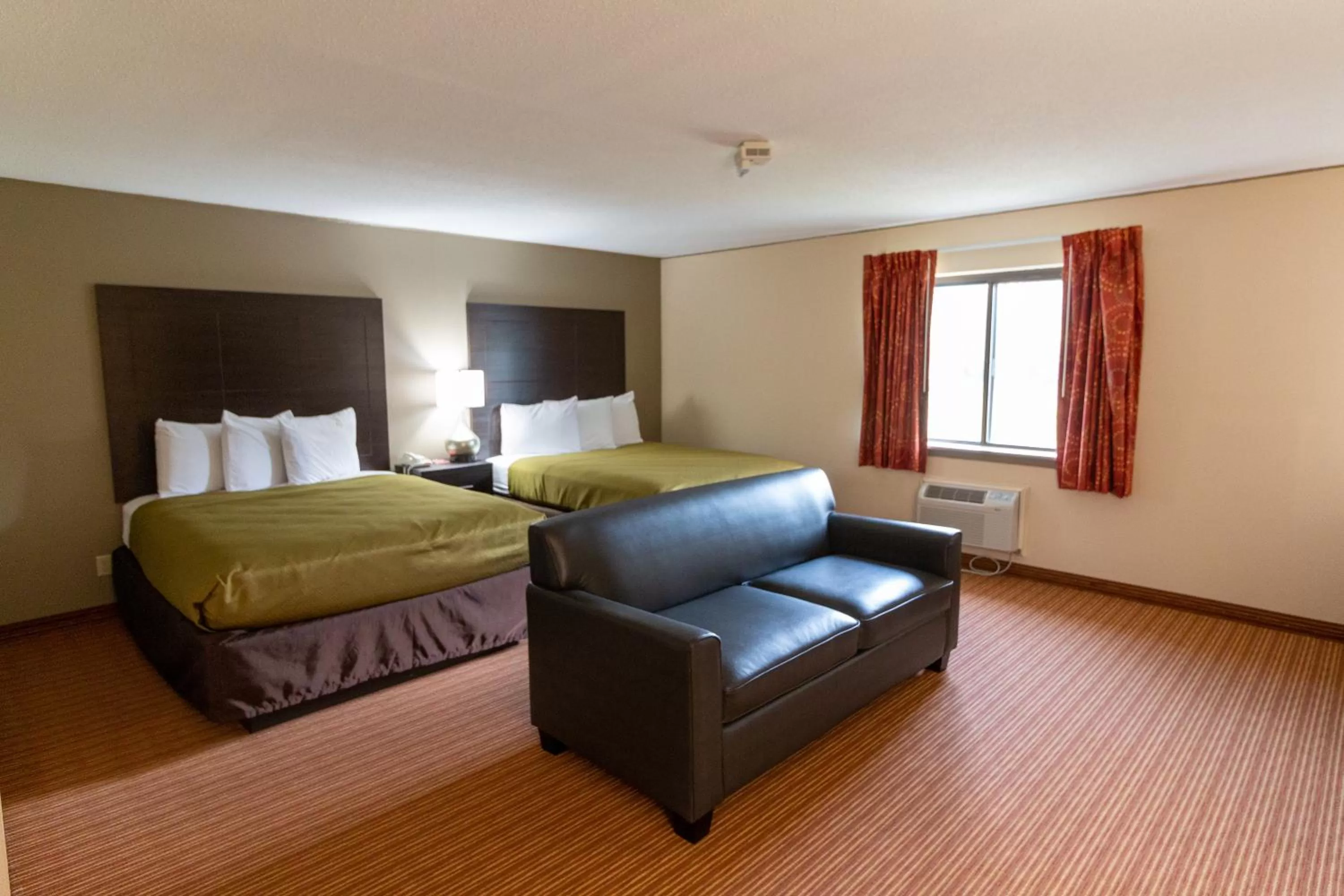 Seating area, Bed in SureStay by Best Western Massena