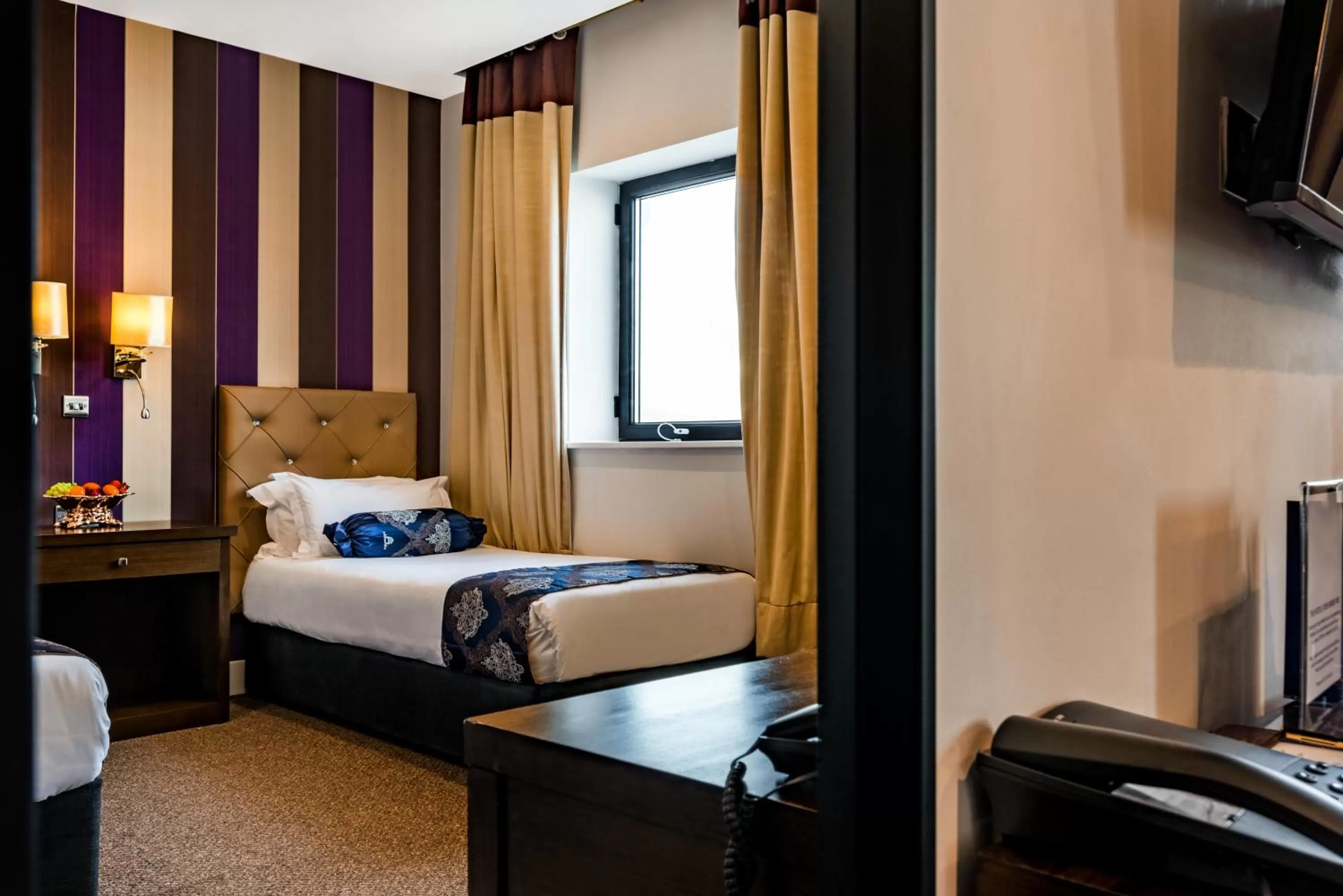 Bed in Grand Sapphire Hotel & Banqueting