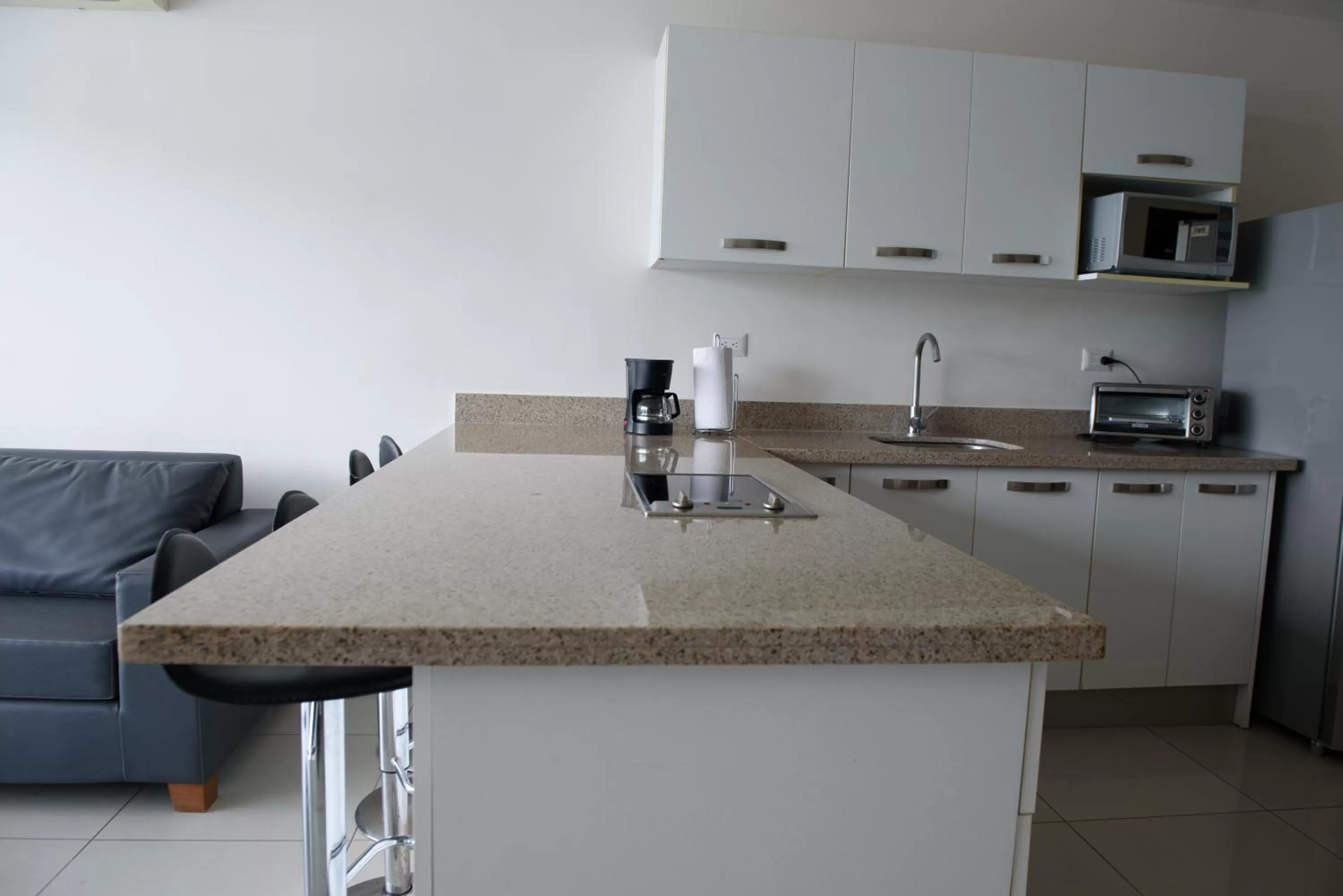 Kitchen or kitchenette in Puerto Azul Hotel