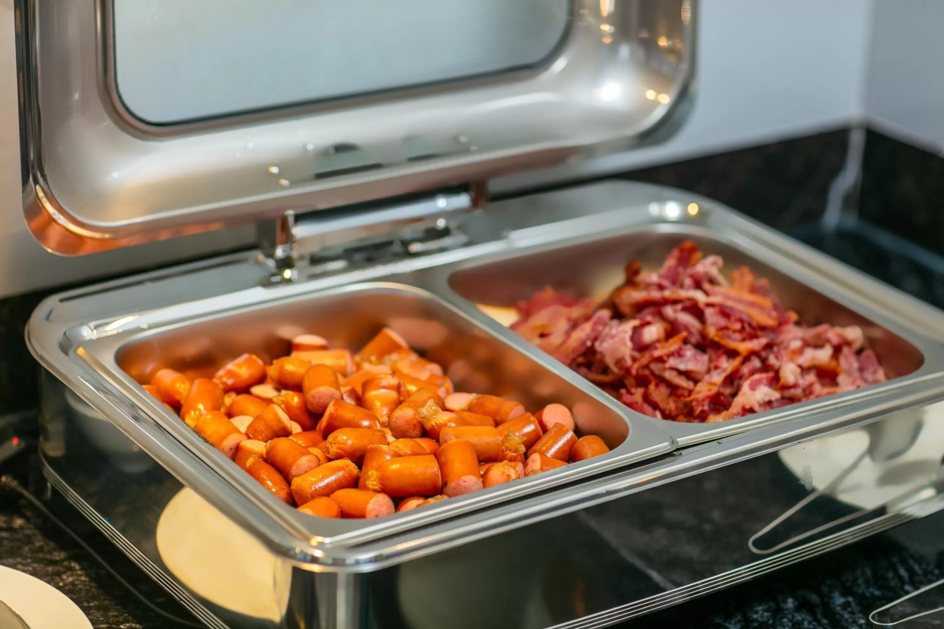 Buffet breakfast in MAY DE VILLE Lakeside Hotel