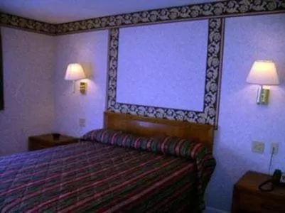 Bed in Passport Inn & Suites Chaplin