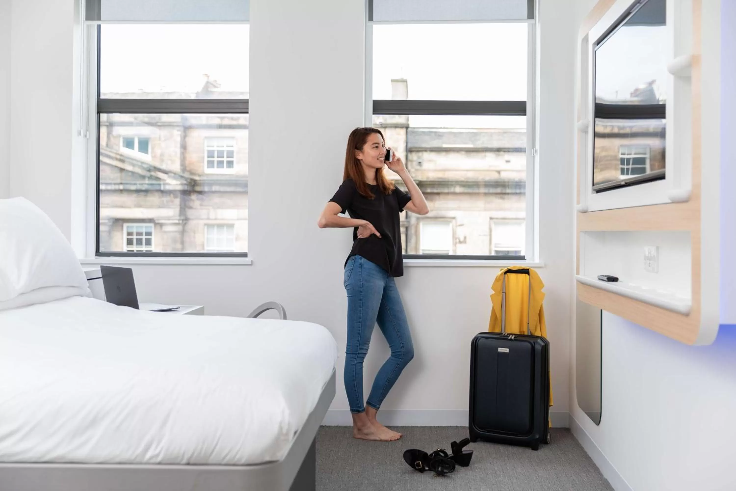 Photo of the whole room, Bed in YOTEL Edinburgh
