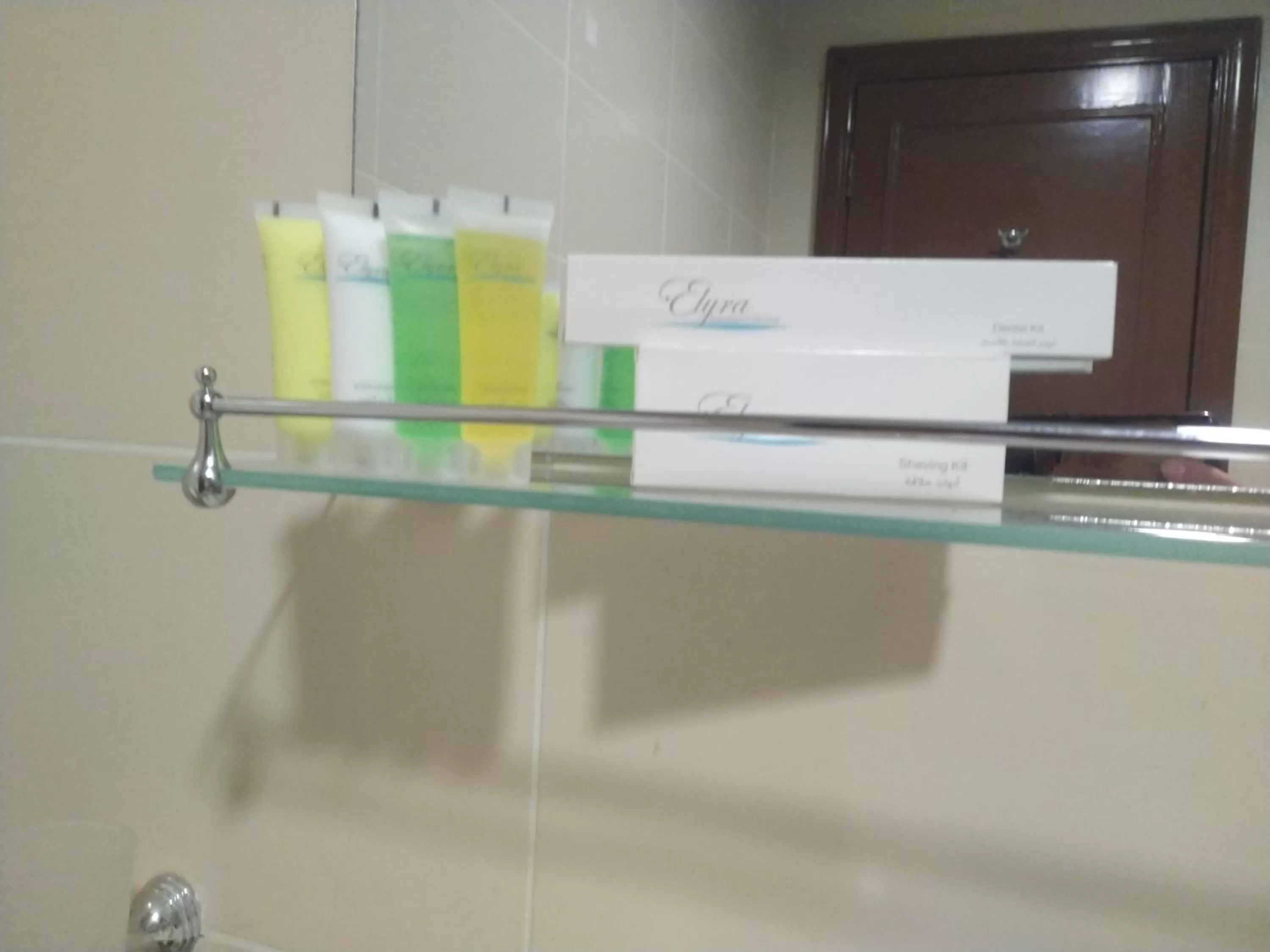 Bathroom, TV/Entertainment Center in Rayan Hotel Suites