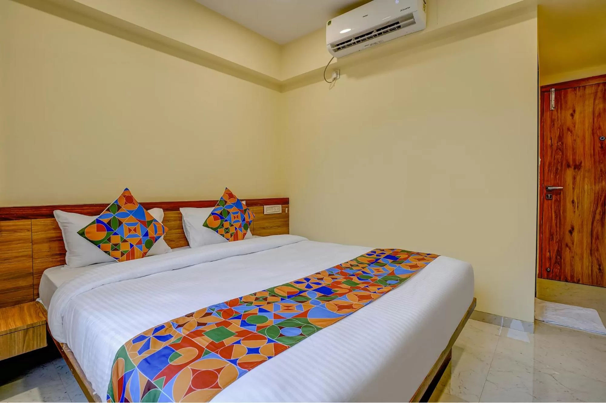 Bed in FabHotel Crystal Homes - nr Rajaram Bhiku stadium