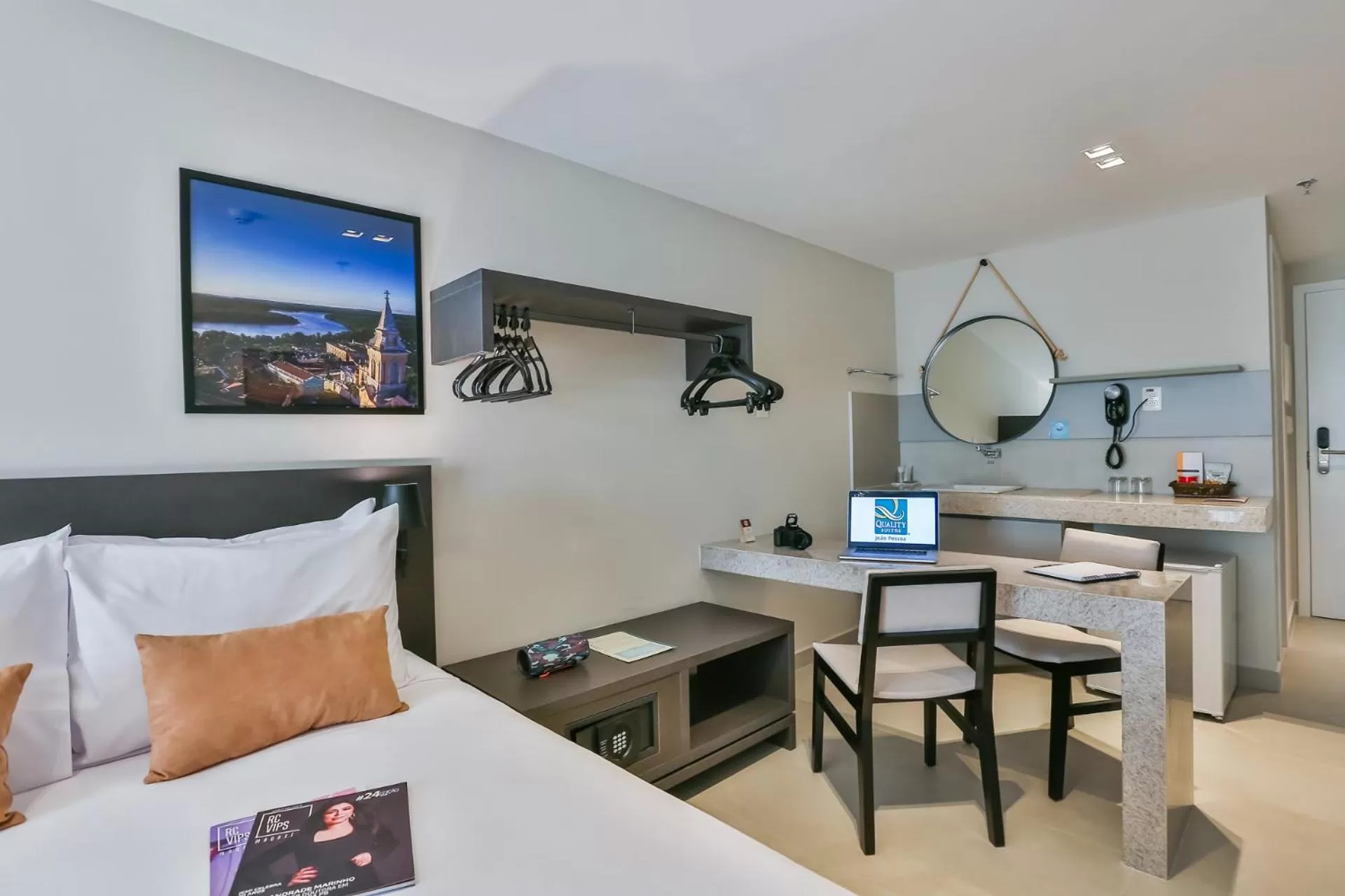 Living room, Bed in Quality Suítes João Pessoa