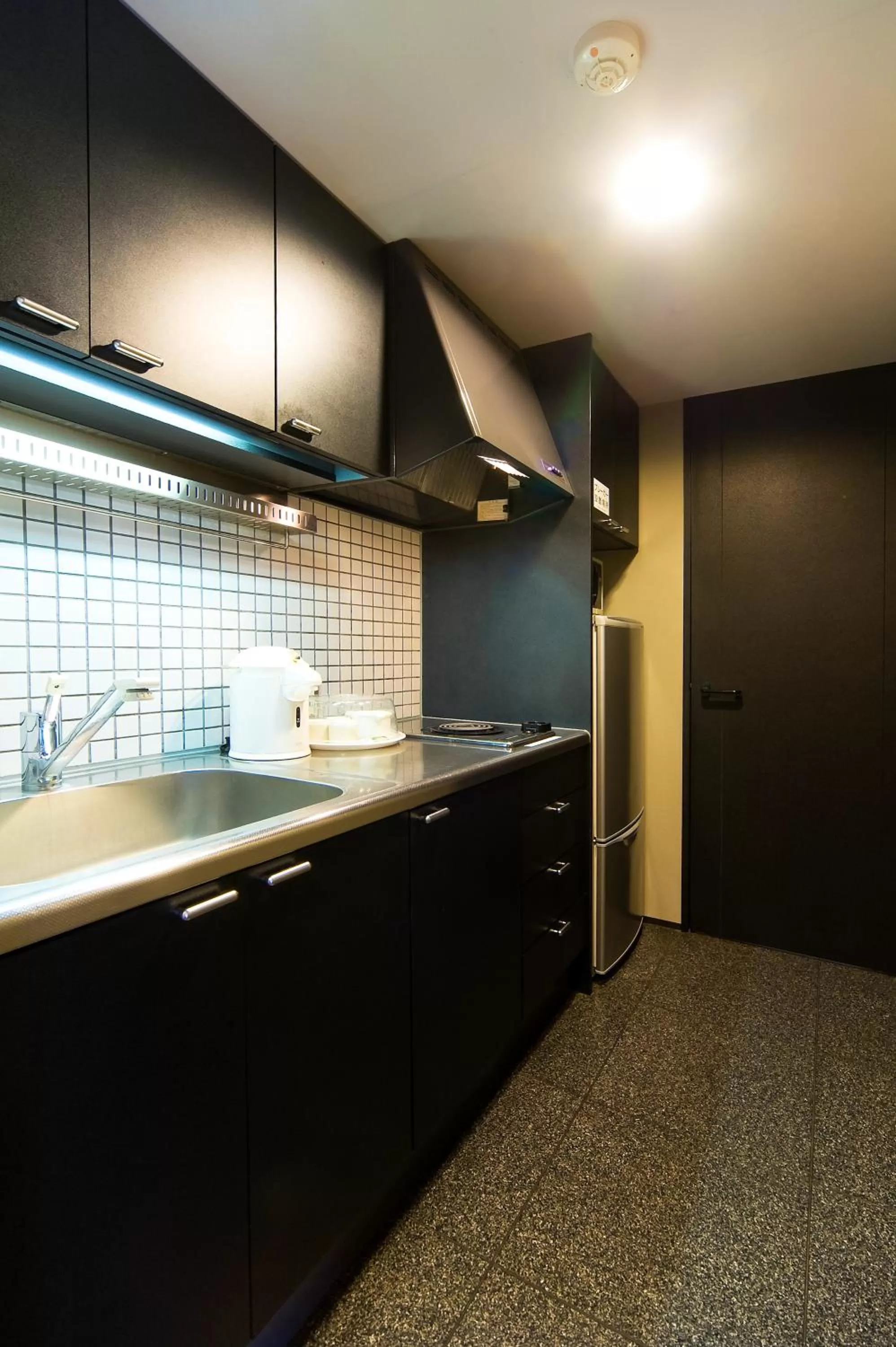 Kitchen or kitchenette in The Residential Suites Fukuoka