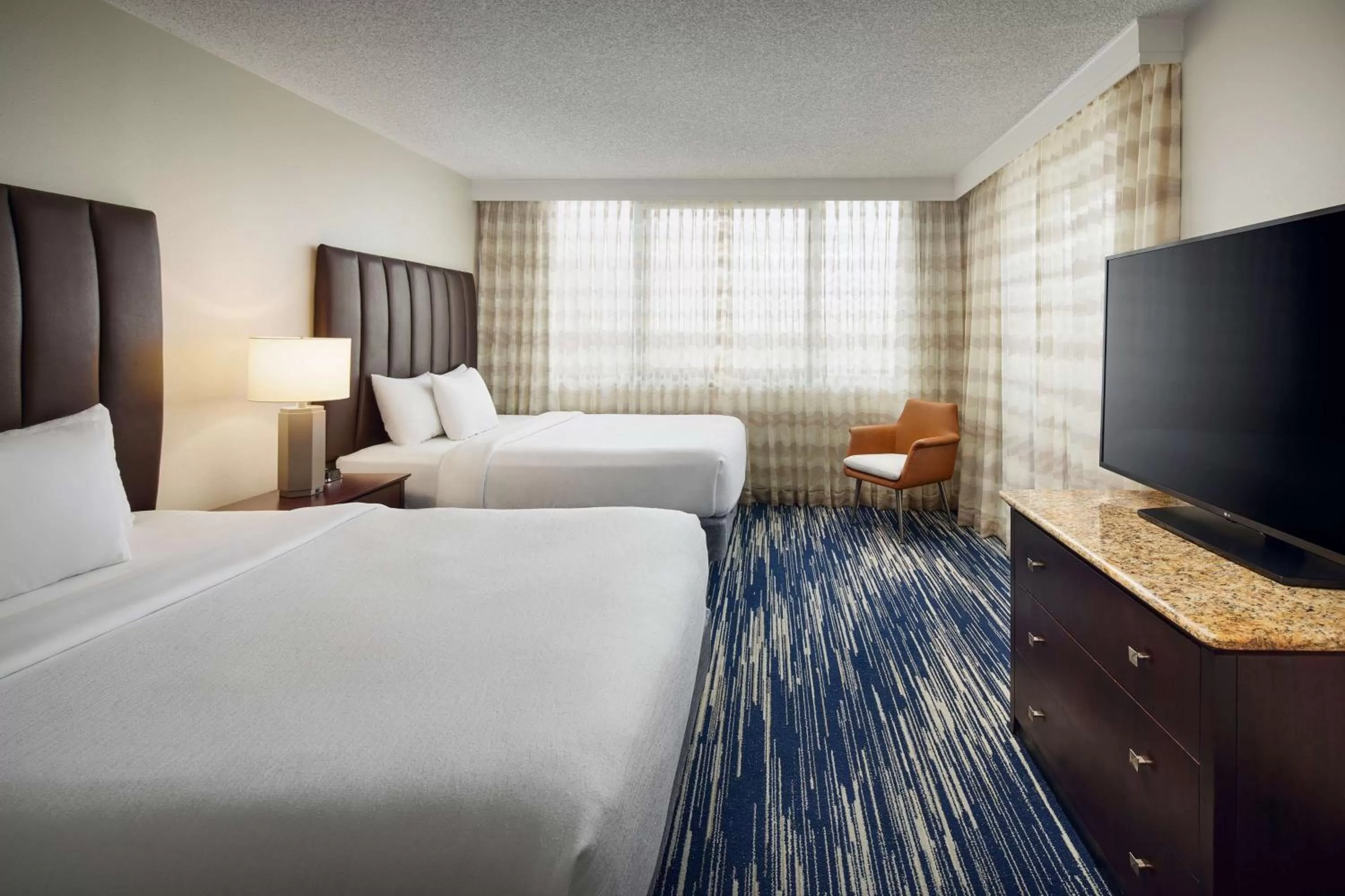 Bed in Embassy Suites by Hilton West Palm Beach Central